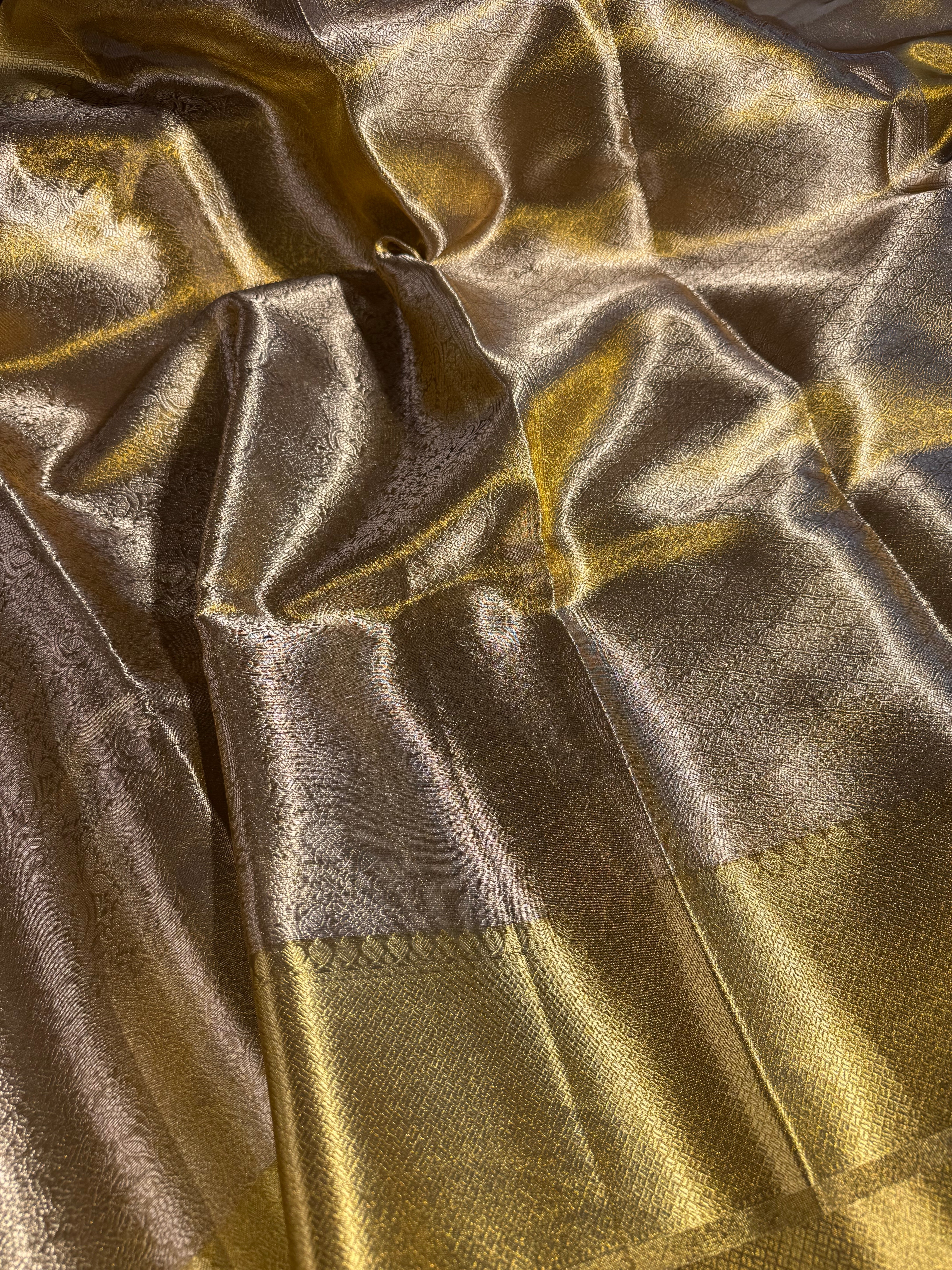 Copper Zari Texture Tissue Silk Kanjivaram Embossed Saree