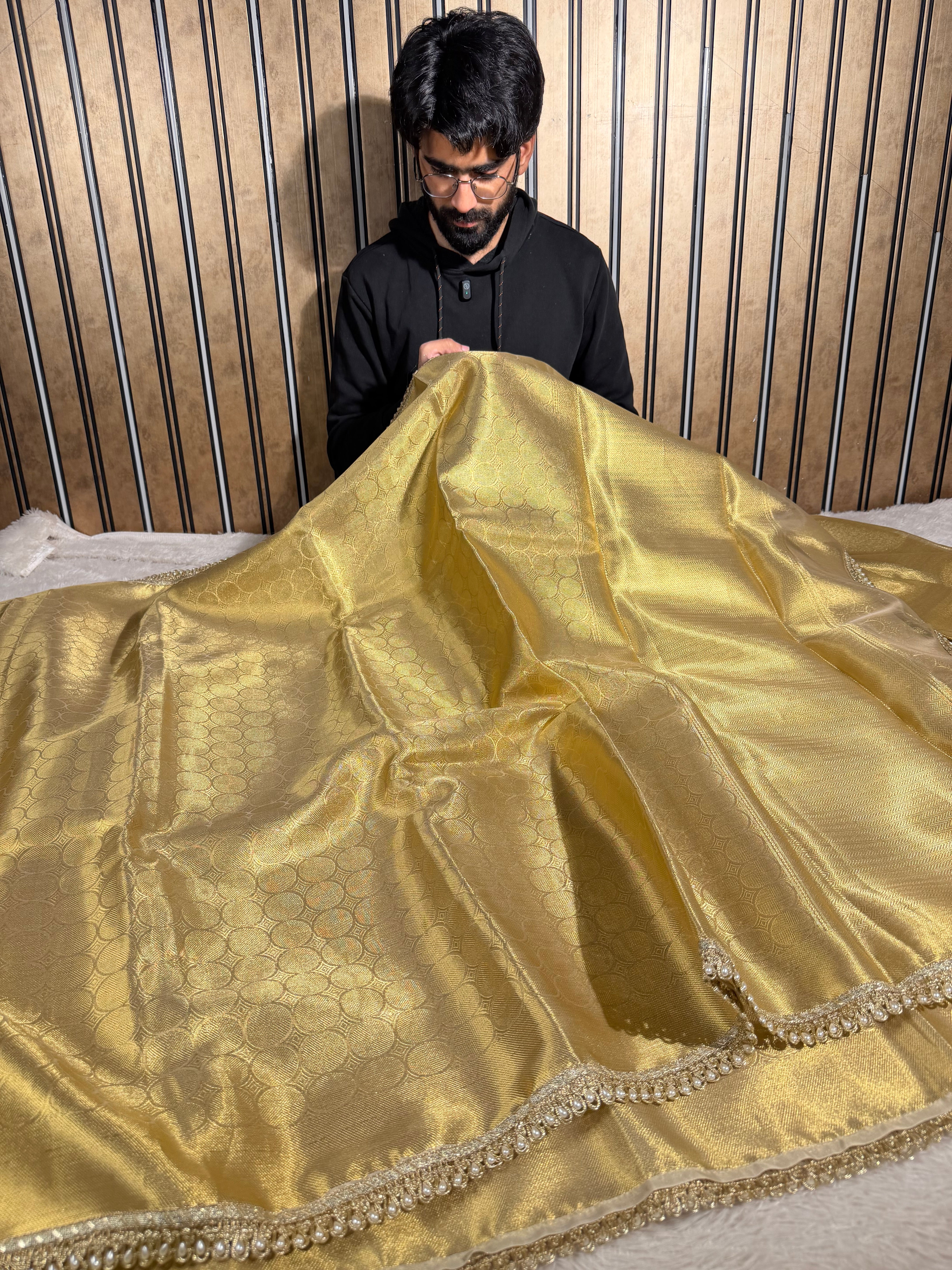 Bright gold kanjivaram tissue lace work saree