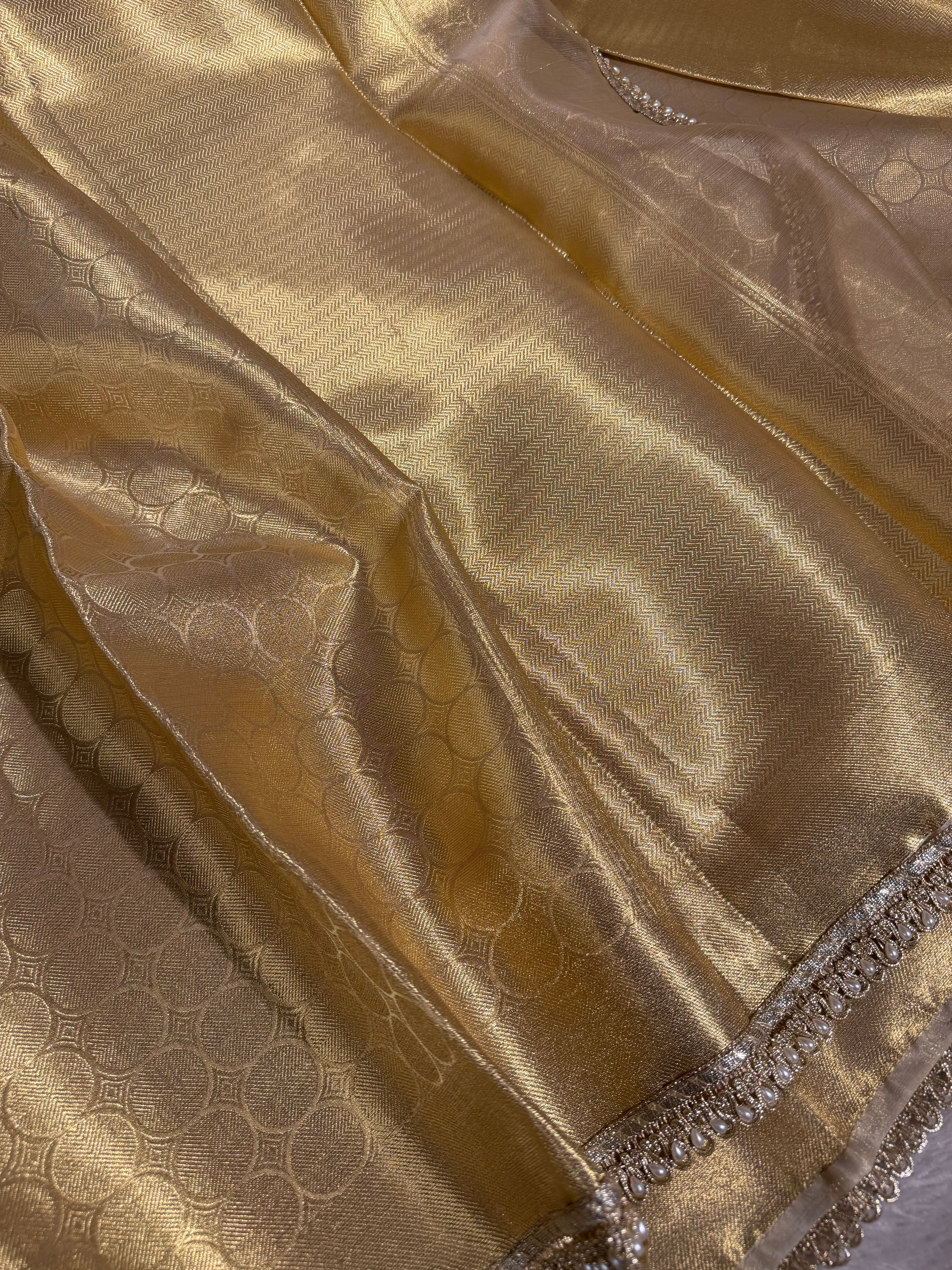 Bright gold kanjivaram tissue lace work saree