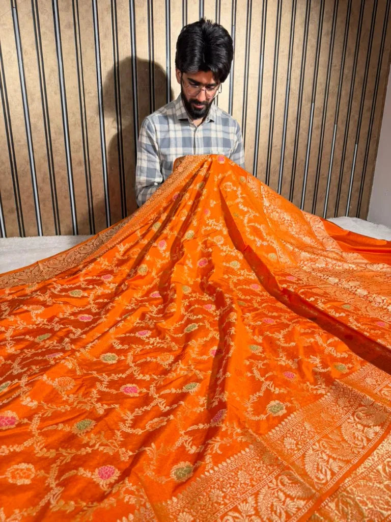 Bright orange floral Meenakari warm silk Banarasi saree