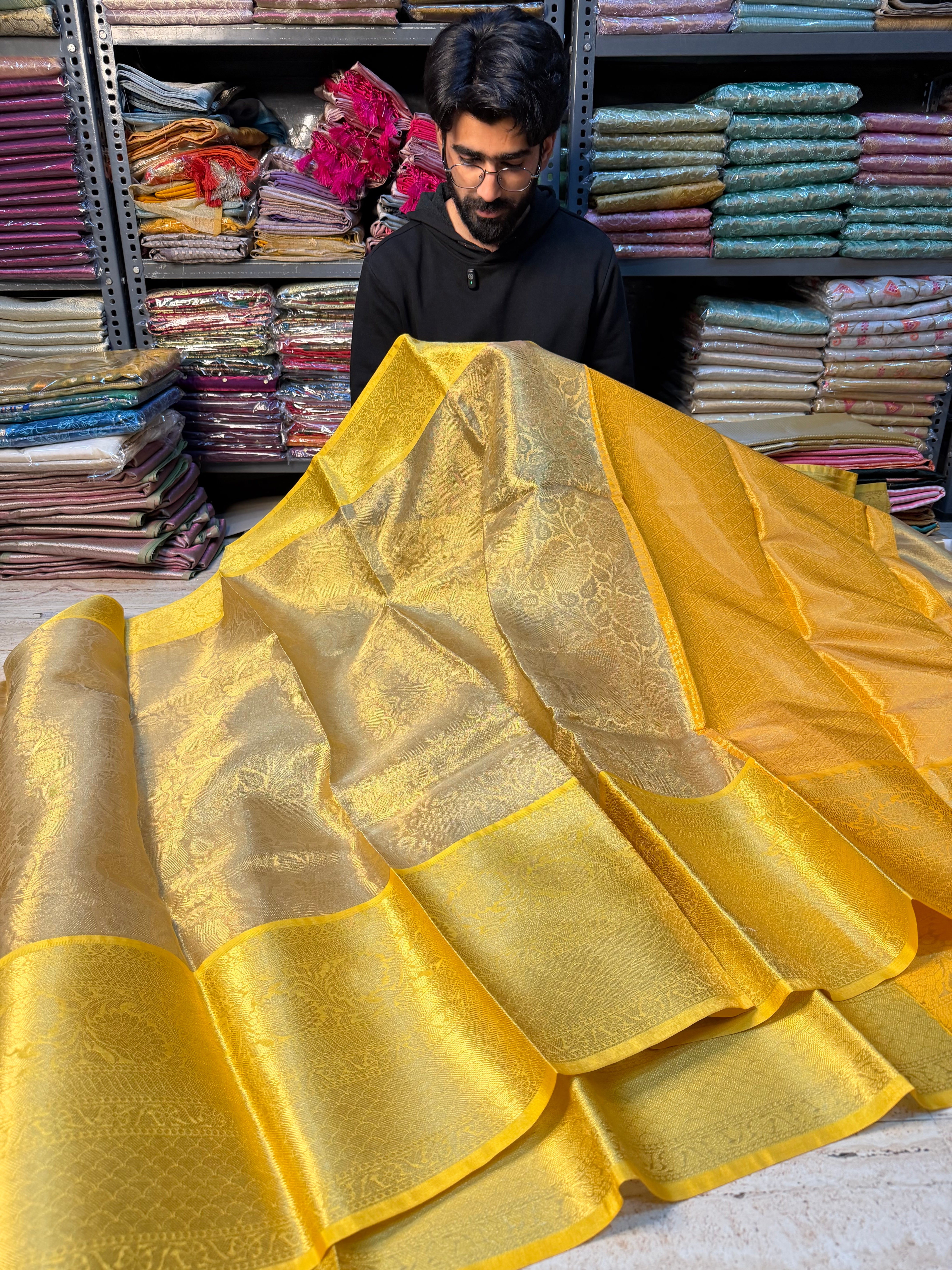 Light gold kanjivaram embossed tissue saree