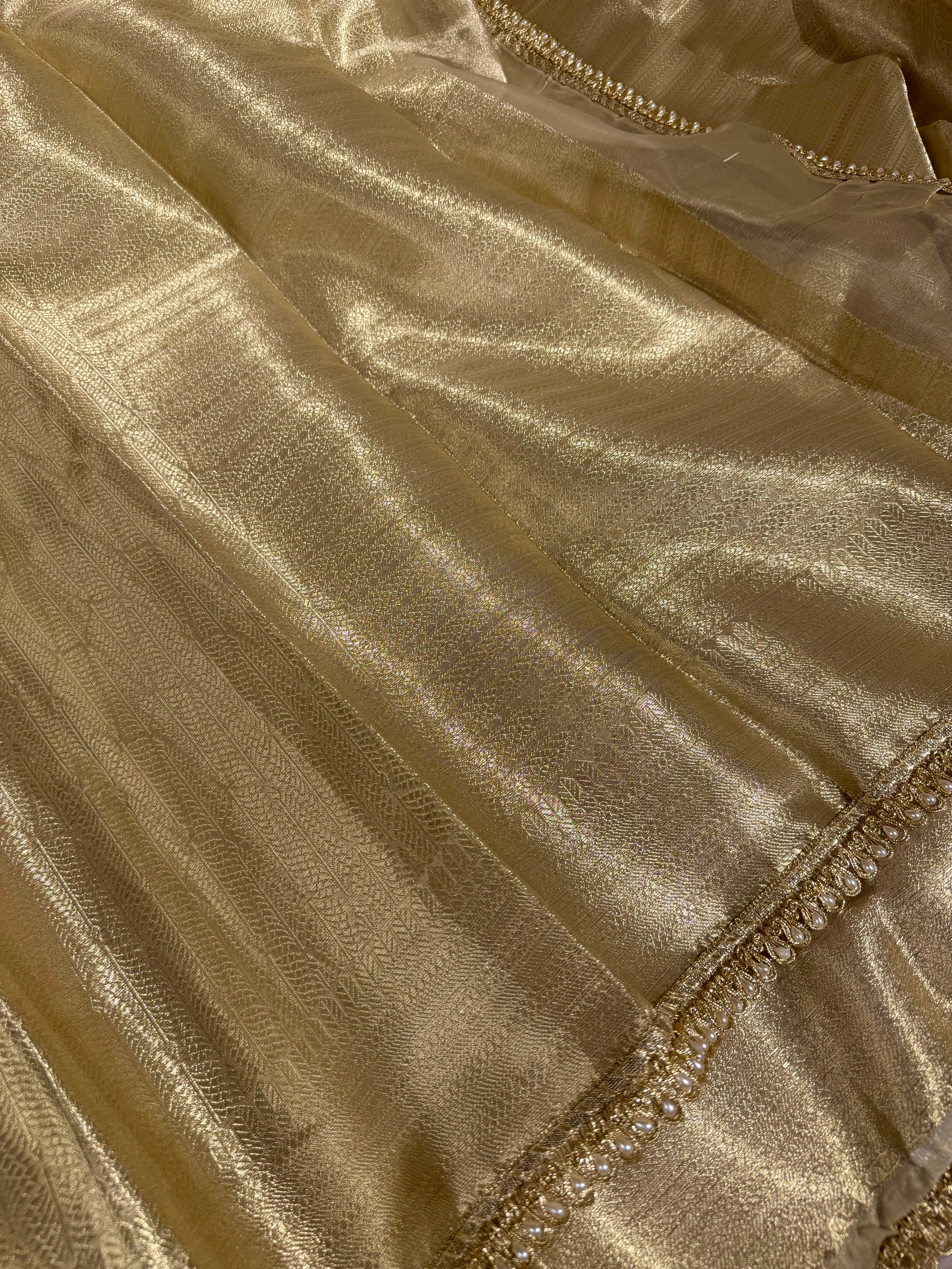 Light gold kanjivaram tissue lace work saree