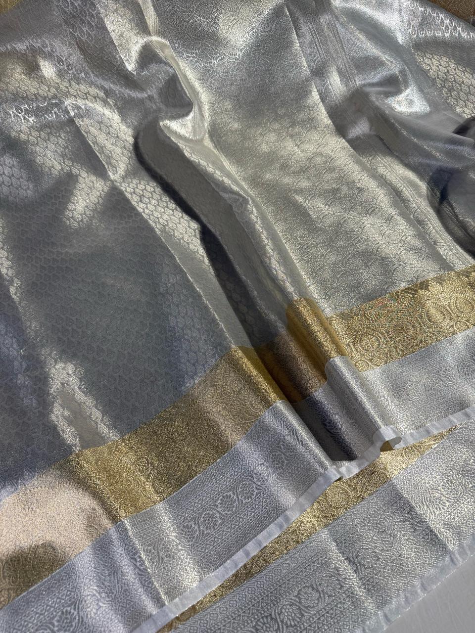 Mesmerising Silver Zari Embossed Weave Kanjivaram Tissue Silk Saree