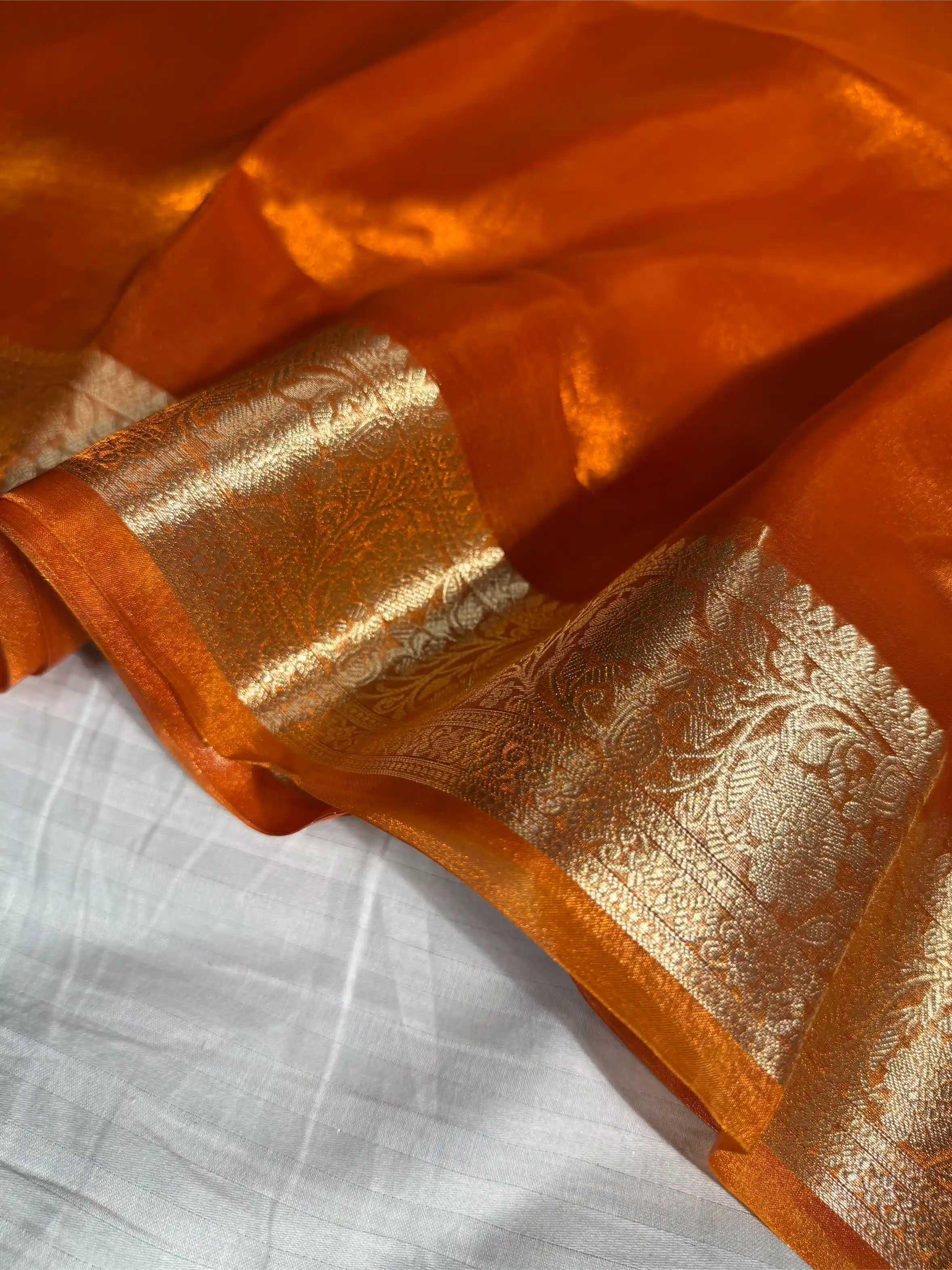 Metallic Orange Pure Tissue Silk Traditional Weave Banarasi Saree