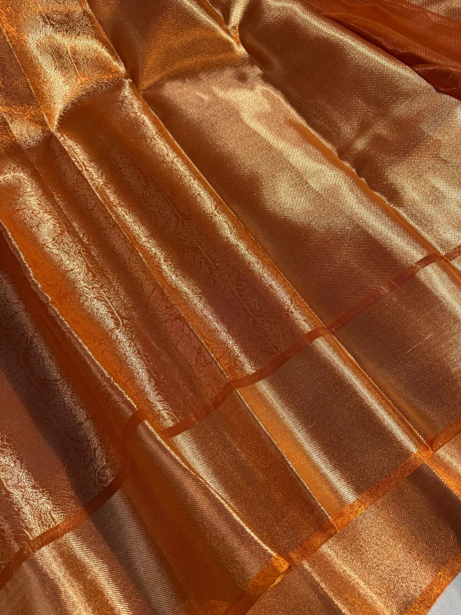 Metallic orange bridal kanjivaram tissue silk saree