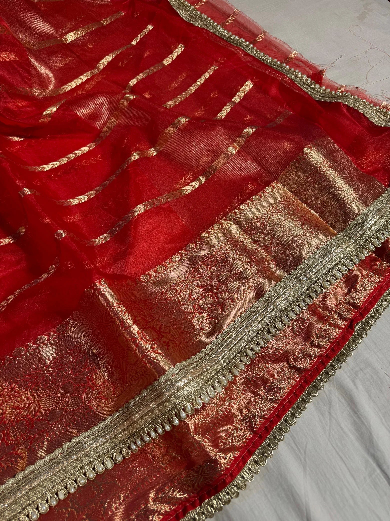 Red banarasi organza silk saree with premium lace work