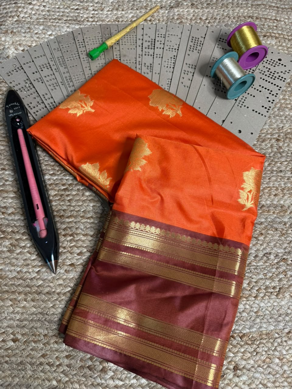 Bright orange floral buta Softsilk saree