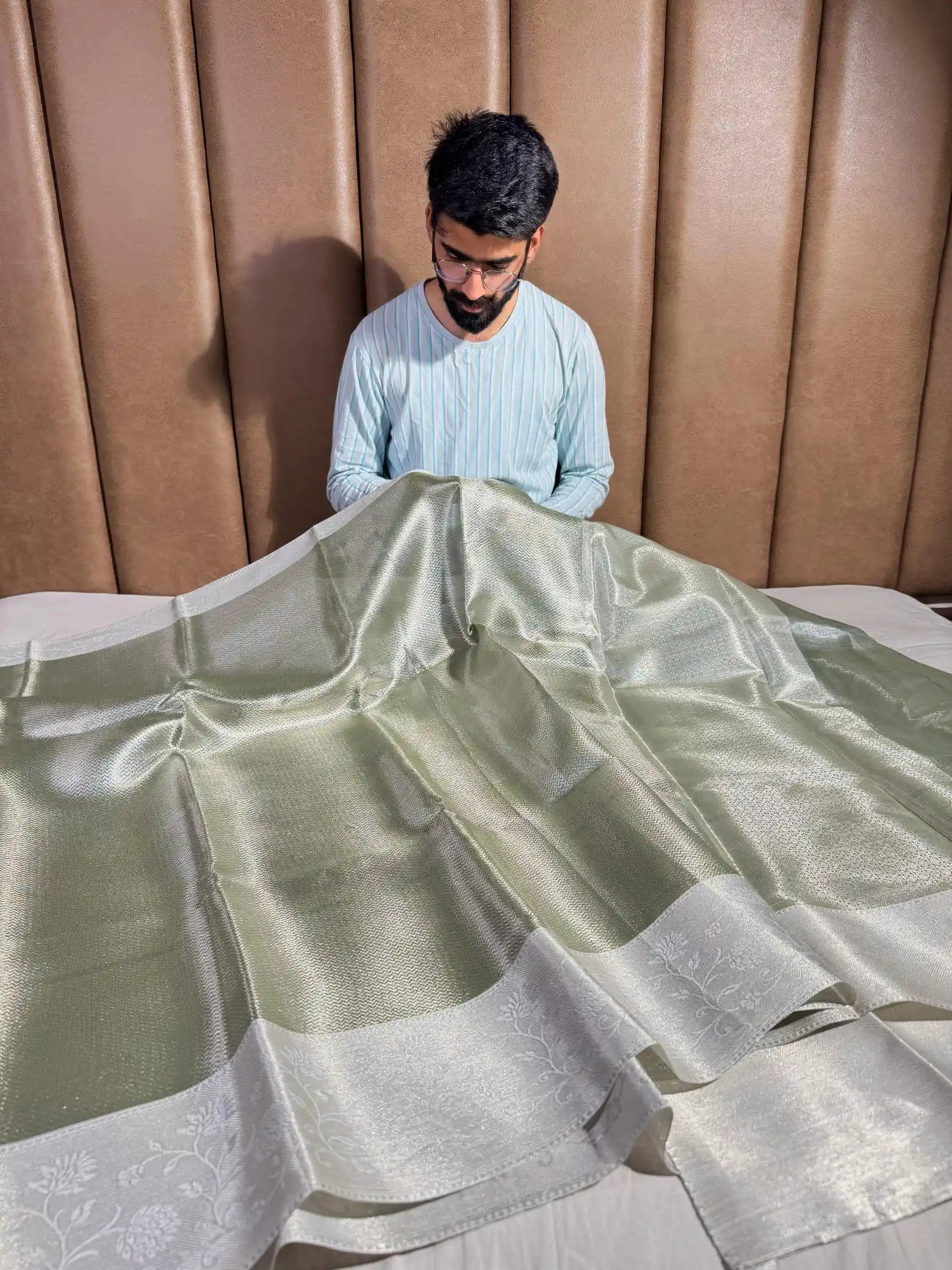 Sea Green Embossed Soft Tissue Silk Saree