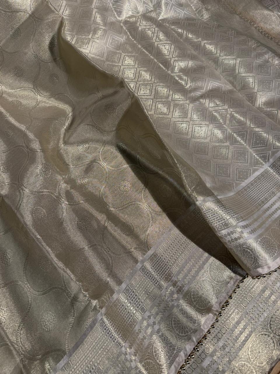 Ivory embossed kanjivaram tissue designer saree