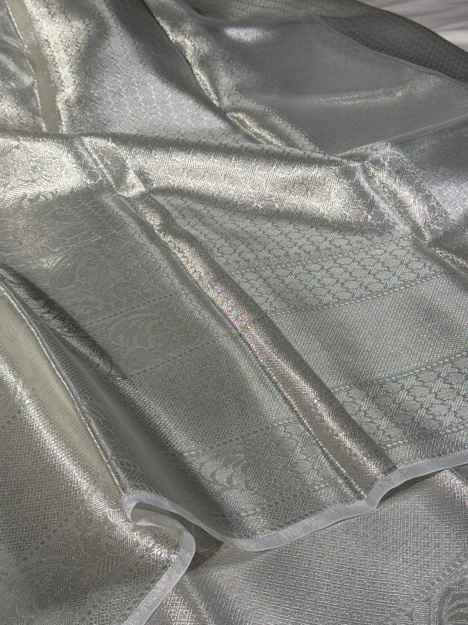 All over silver embossed kanjivaram tissue saree