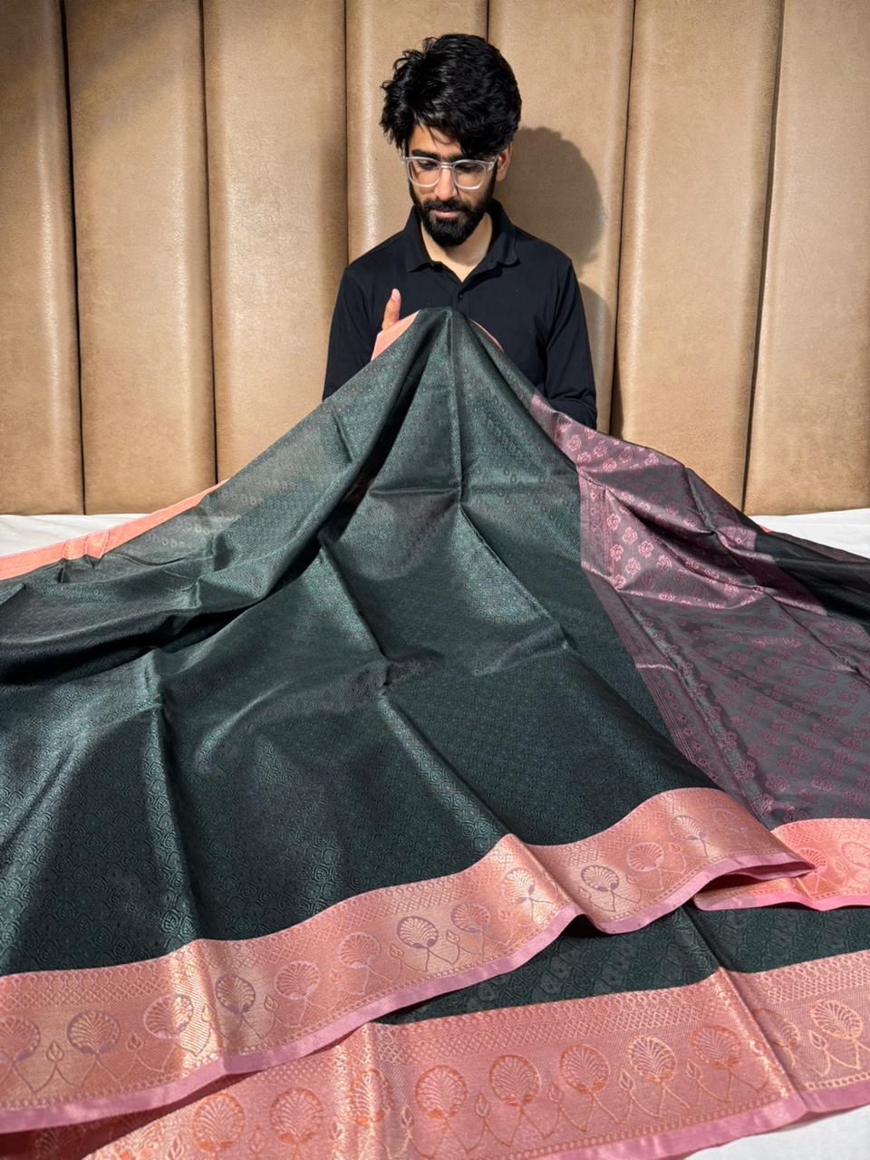 Bottle green embossed tanchoi Banarasi saree