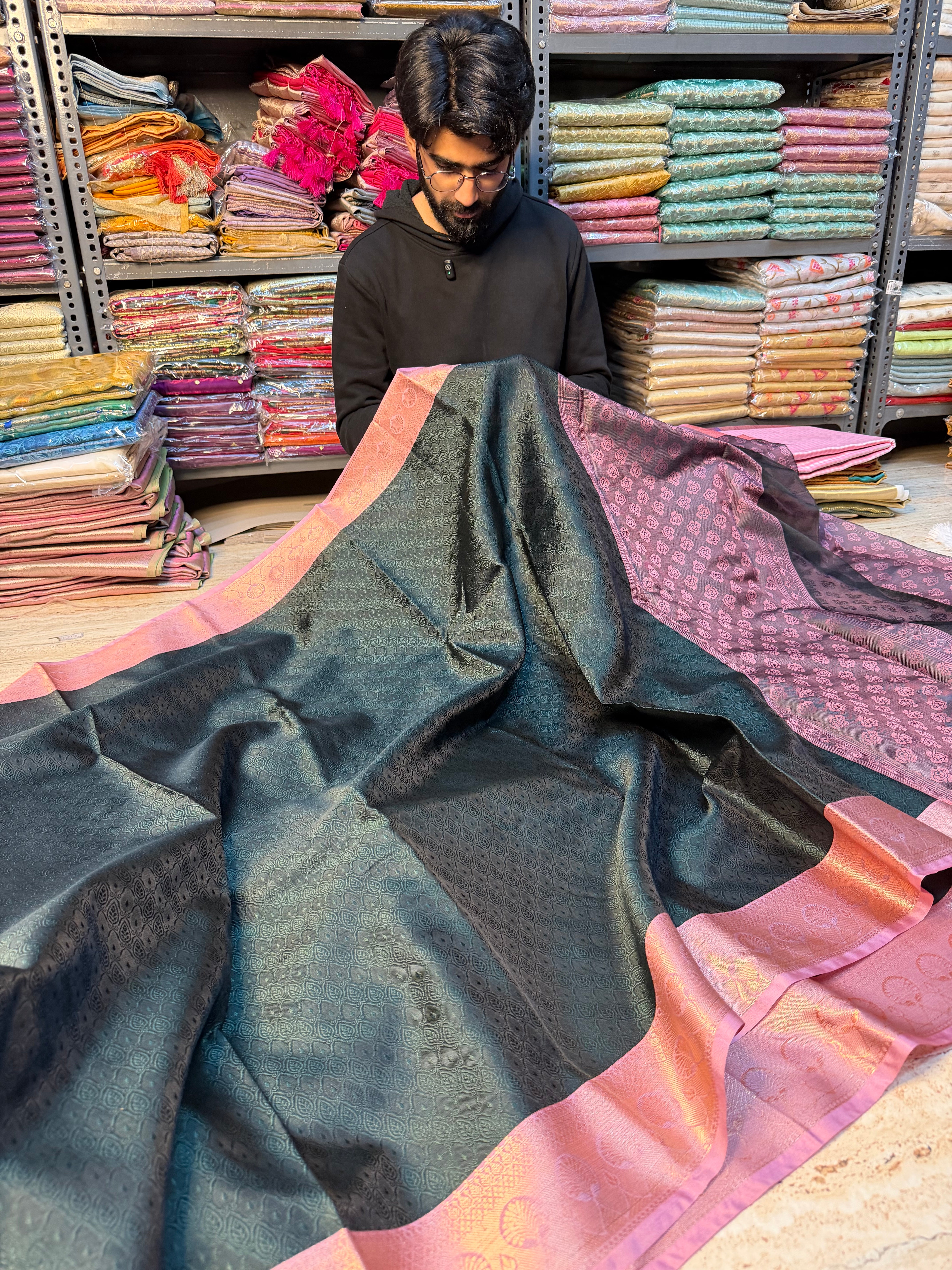 Bottle green kanchi kora embossed weave saree