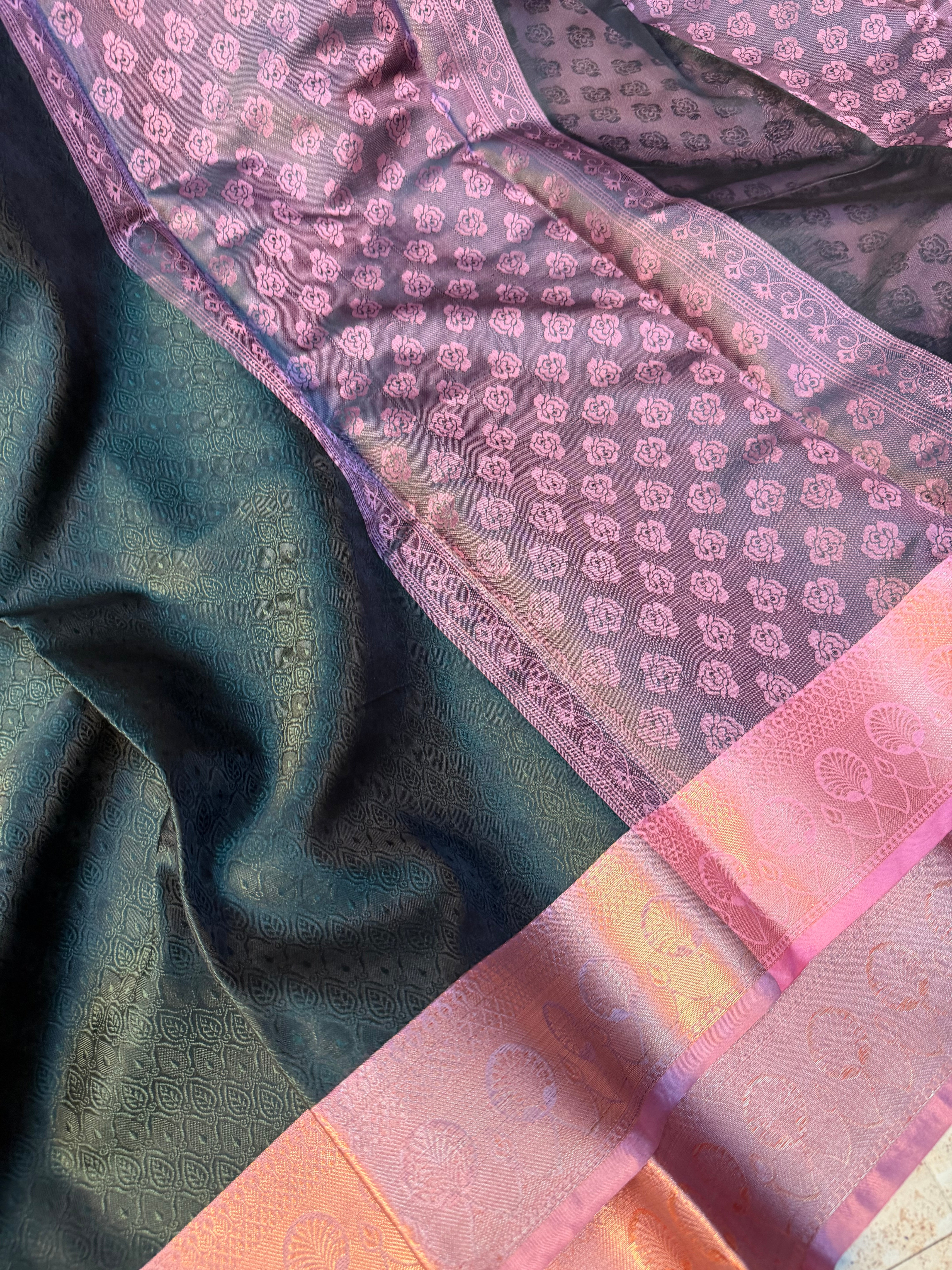 Bottle green kanchi kora embossed weave saree