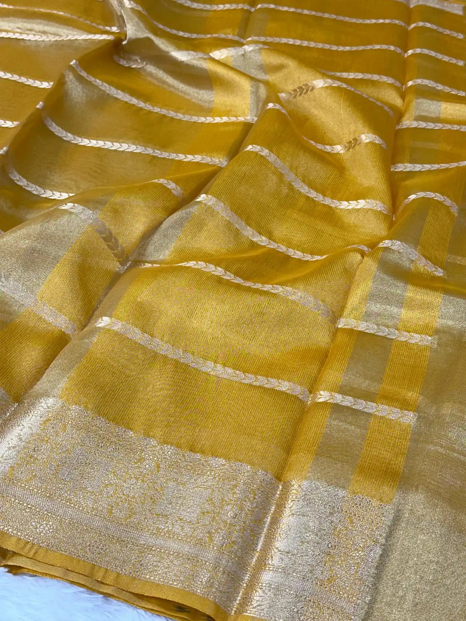 Metallic yellow soft tissue silk traditional saree