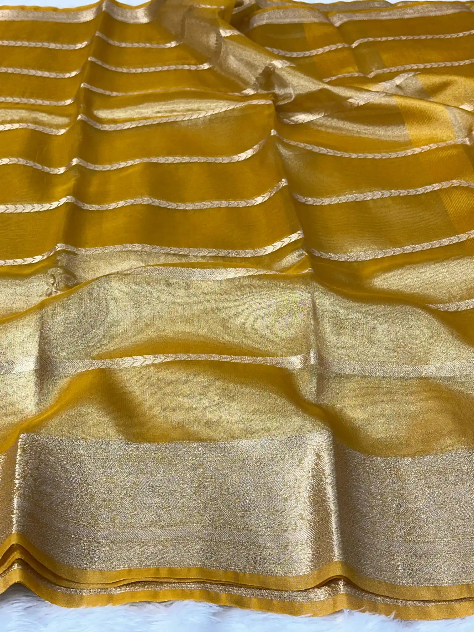 Metallic yellow soft tissue silk traditional saree