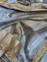 Ash Grey Shade Glass Tissue Silk Saraee with Heavy Latkans in Maharani Edition