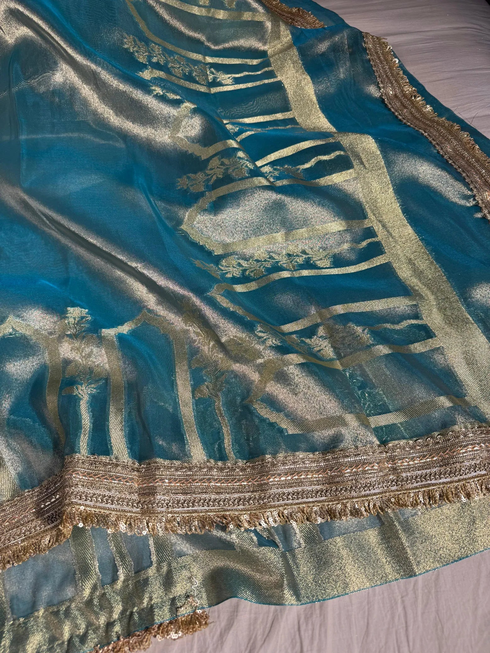 Banarasi premium mughal art tissue silk saree with heavy lacework