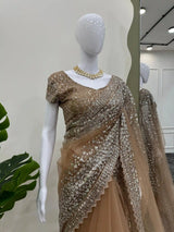 Beige Shade Glossy Net Shimmery Seauins Work Saree