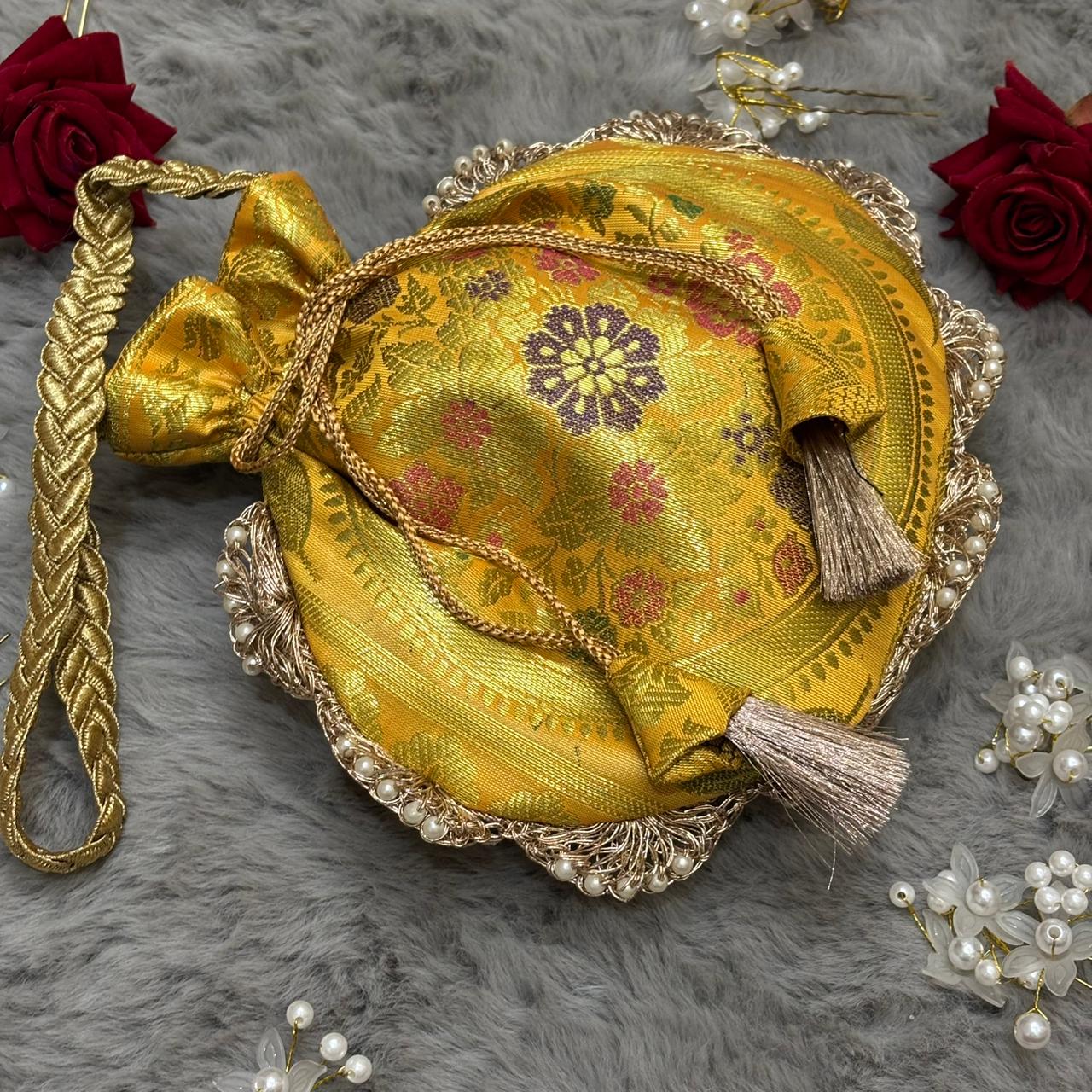 Bright Yellow Eccentric Lace Work Banarasi Potli Bags