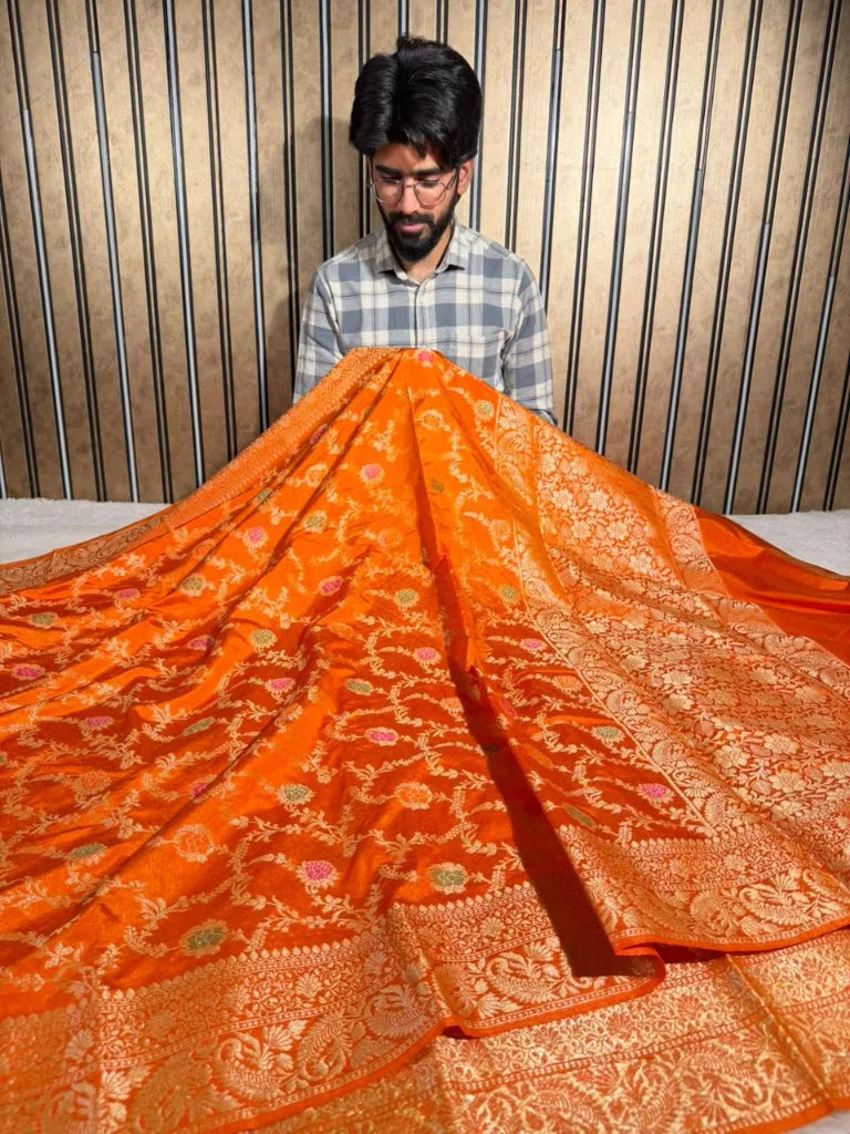 Bright orange floral Meenakari warm silk Banarasi saree