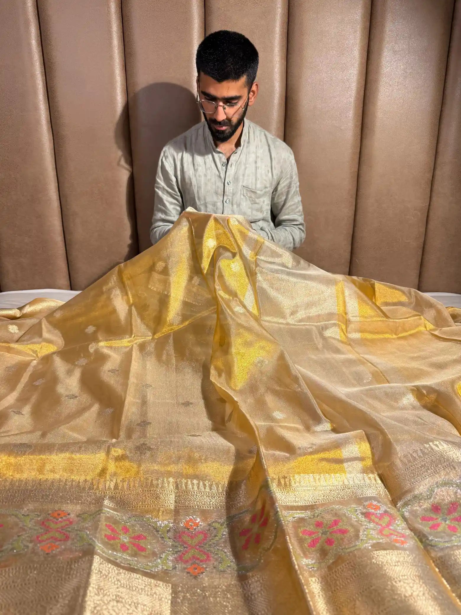 Eccentric Copper Tissue Silk Banarasi Saree with Exclusive Pochampally Border