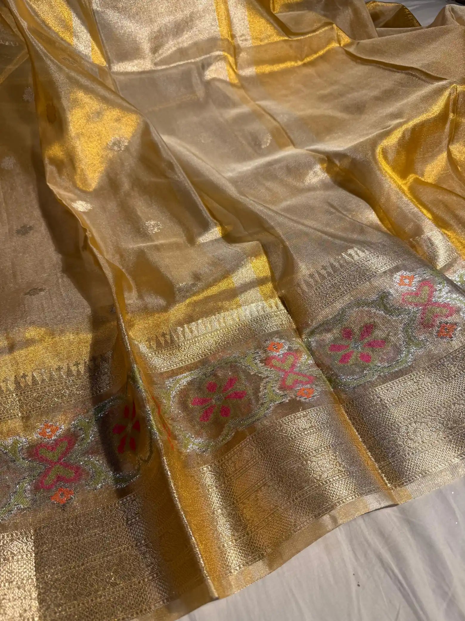 Eccentric Copper Tissue Silk Banarasi Saree with Exclusive Pochampally Border