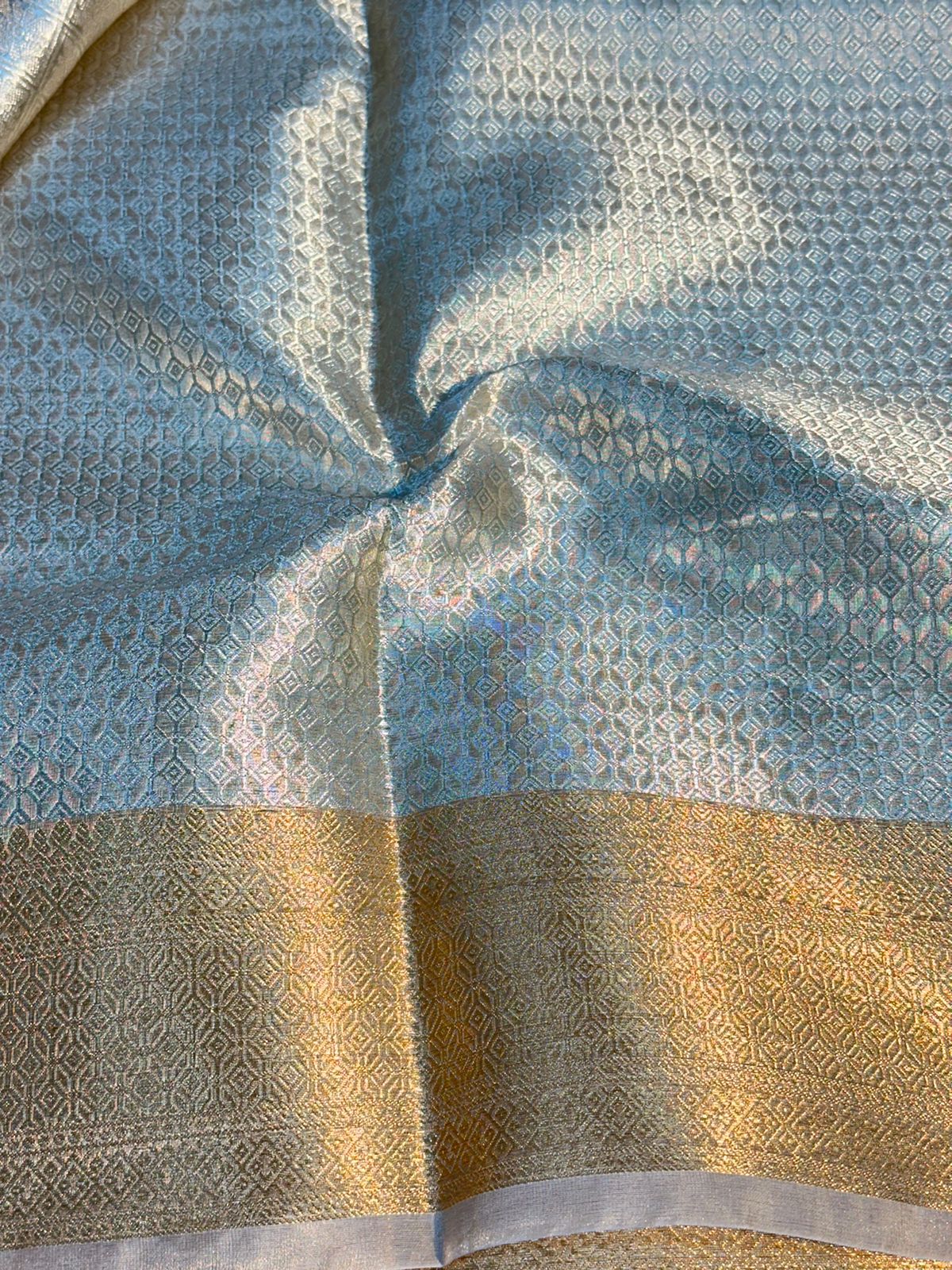 Eccentric Pure Tissue Silk Embossed Brocade Weave Banarasi Saree