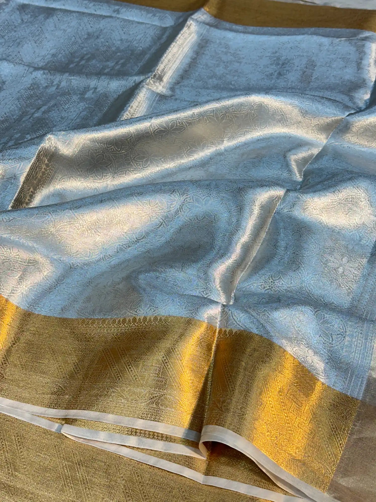 Eccentric Pure Tissue Silk Embossed Brocade Weave Banarasi Saree