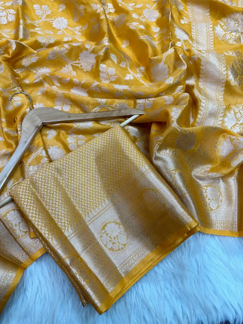 
Fanta Orange Floral Chinia Silk Banarasi Saree
