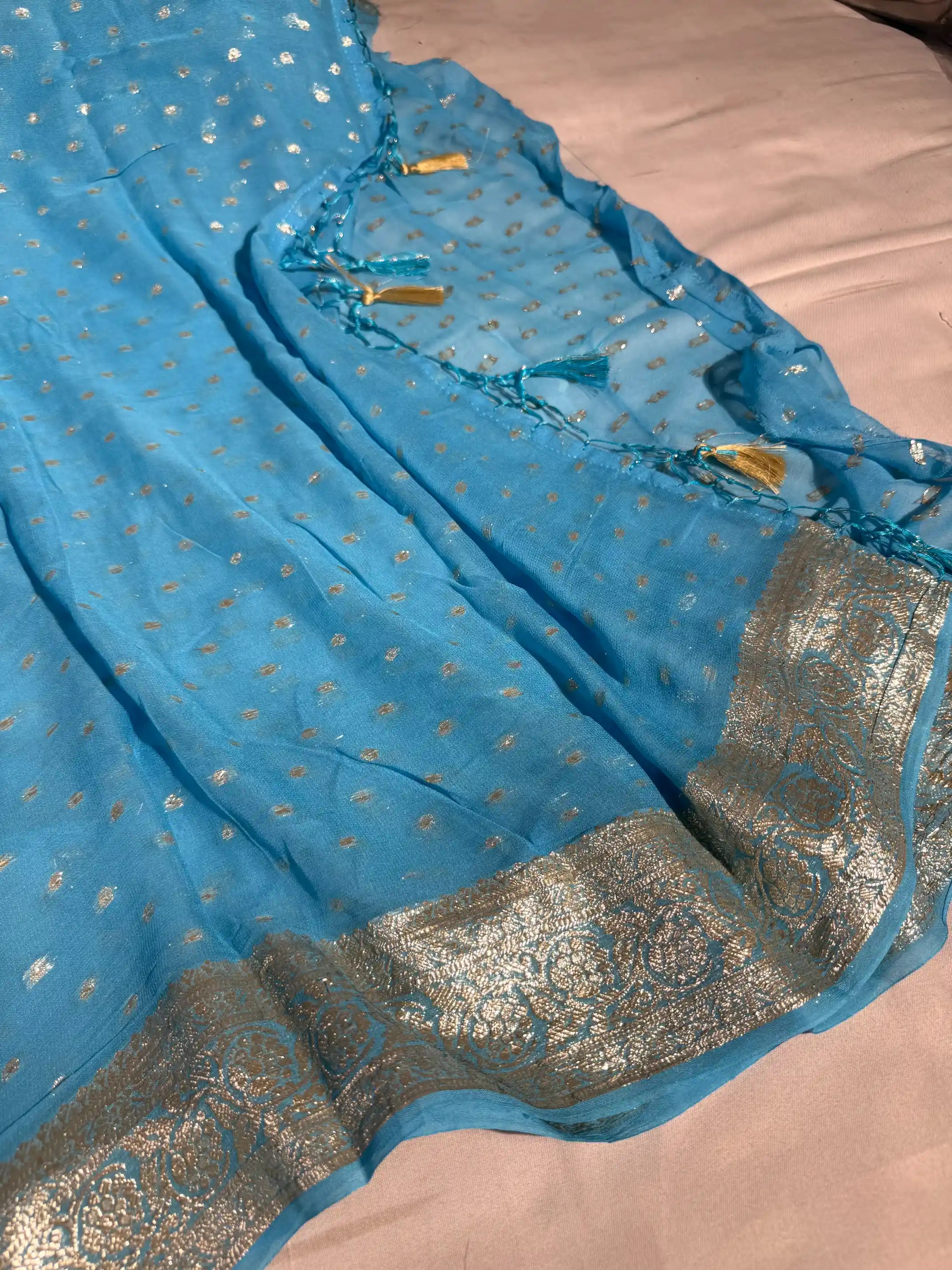 Firozi Blue Viscose Georgette Silk Handmade Tassles Banarasi Saree