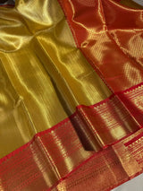 Golden Shimmery Glare in Embossed Soft Tissue Silk Saree
