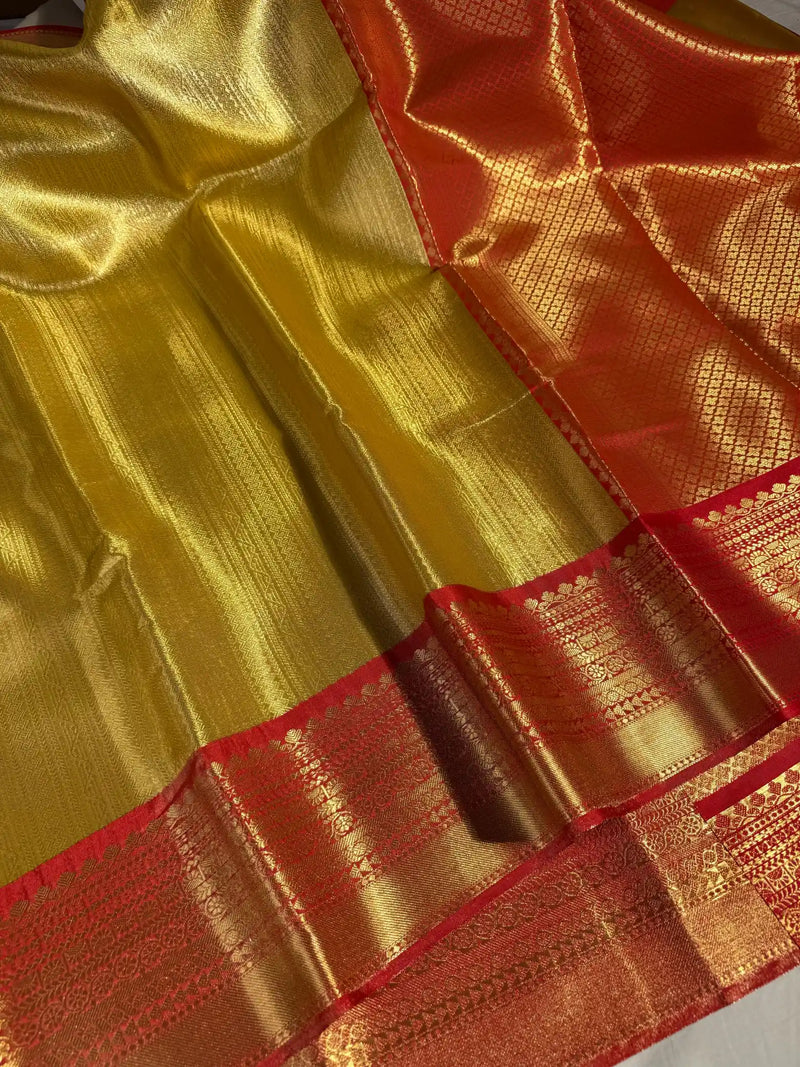 Golden Shimmery Glare in Embossed Soft Tissue Silk Saree