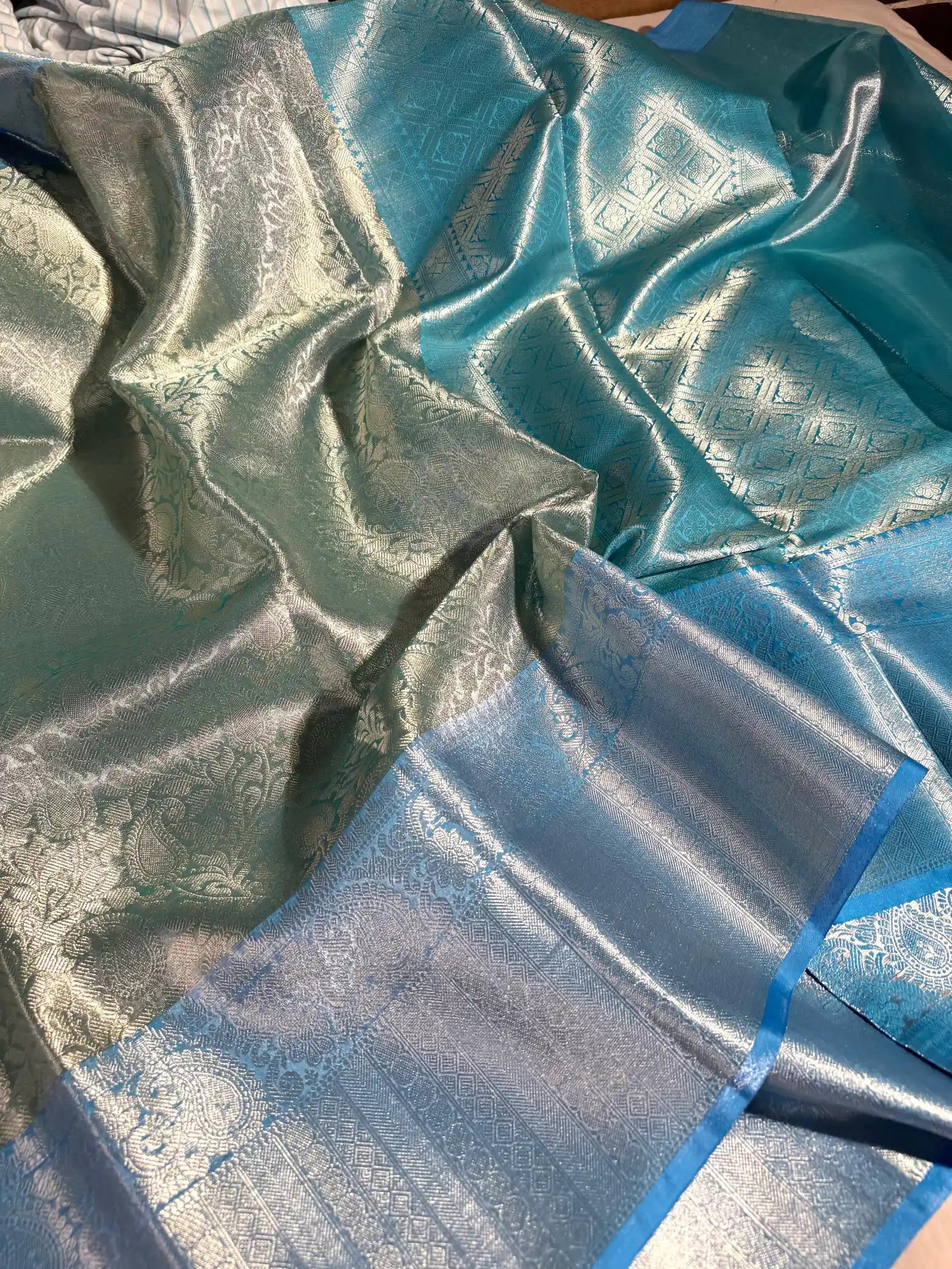Light Blueish Texture Embossed Soft Tissue Silk Banarasi Saree