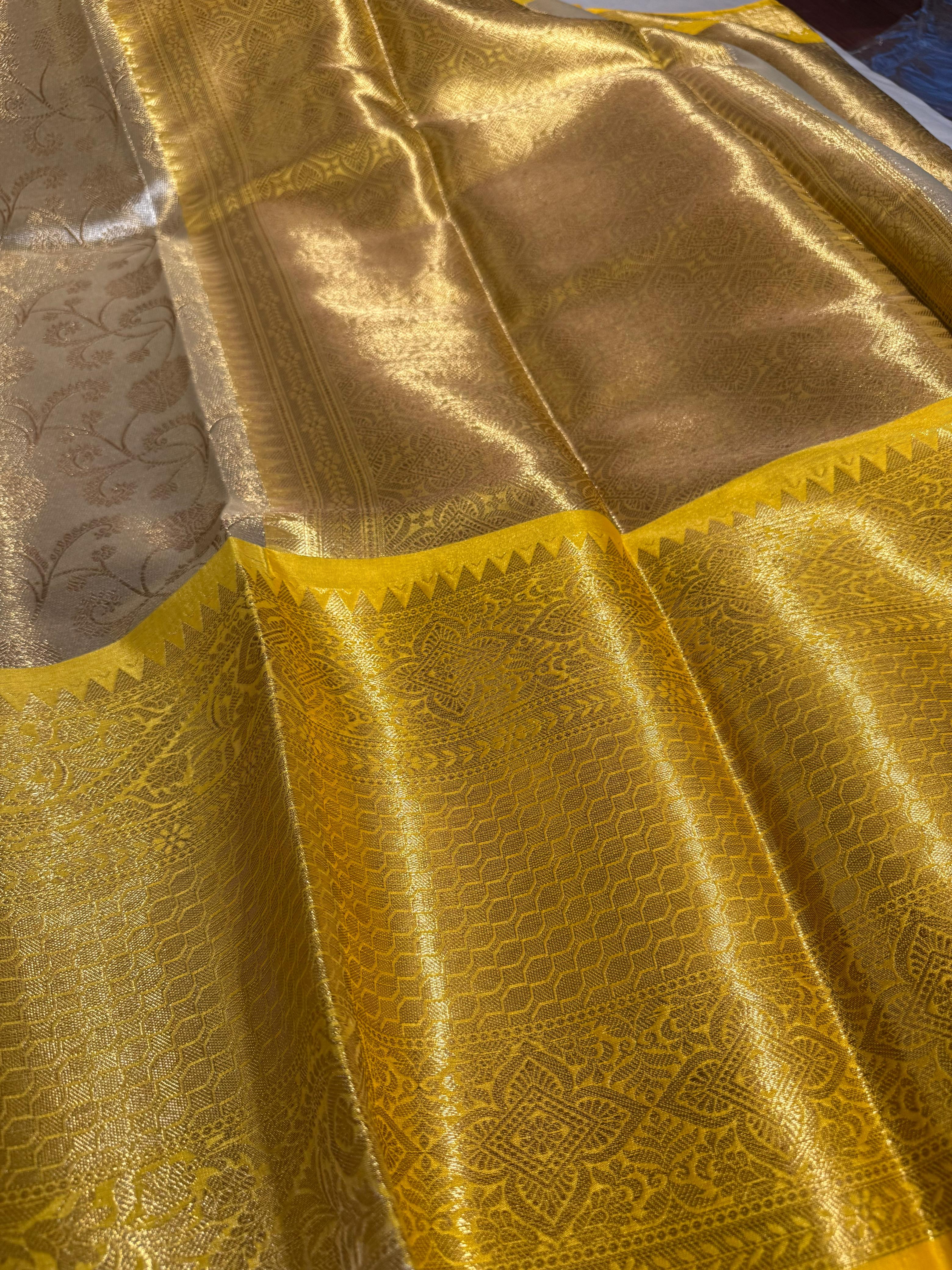 Light gold embossed Katan tissue silk saree