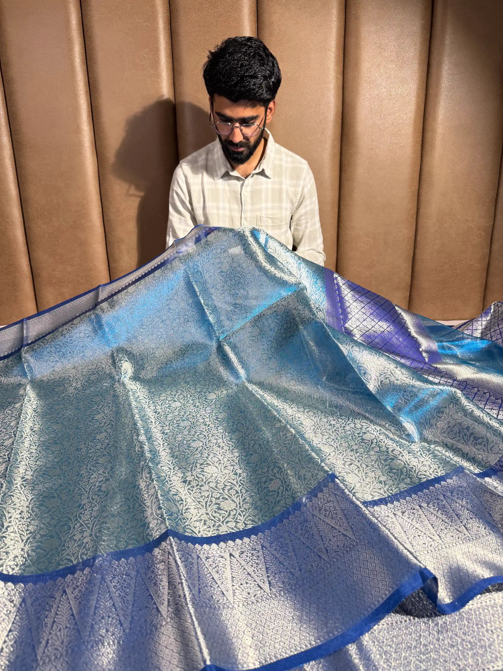 Metallic Firozi Blue Tissue Silk Kanjivaram Embossed Banarasi Saree