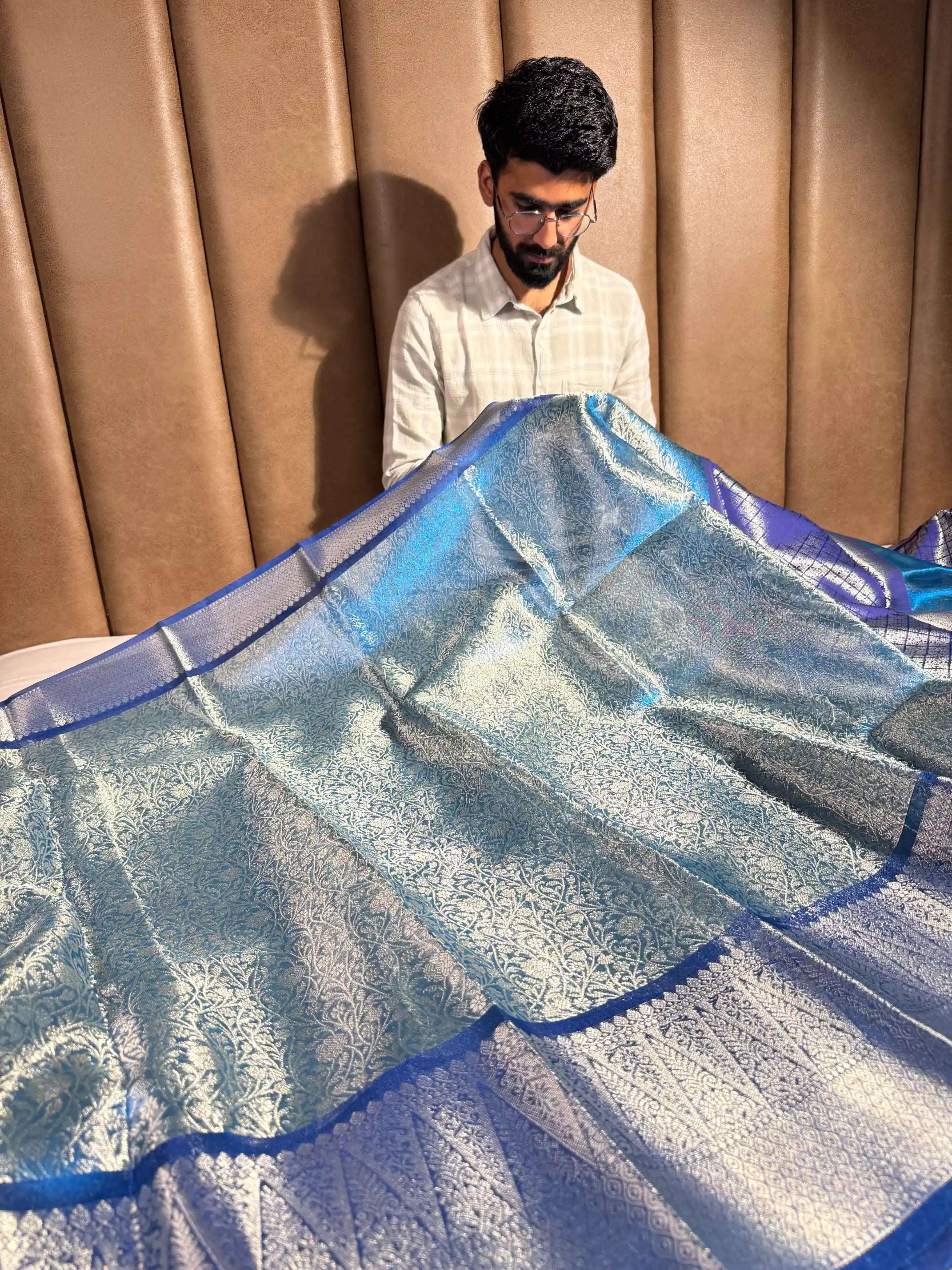 Metallic Firozi Blue Tissue Silk Kanjivaram Embossed Banarasi Saree