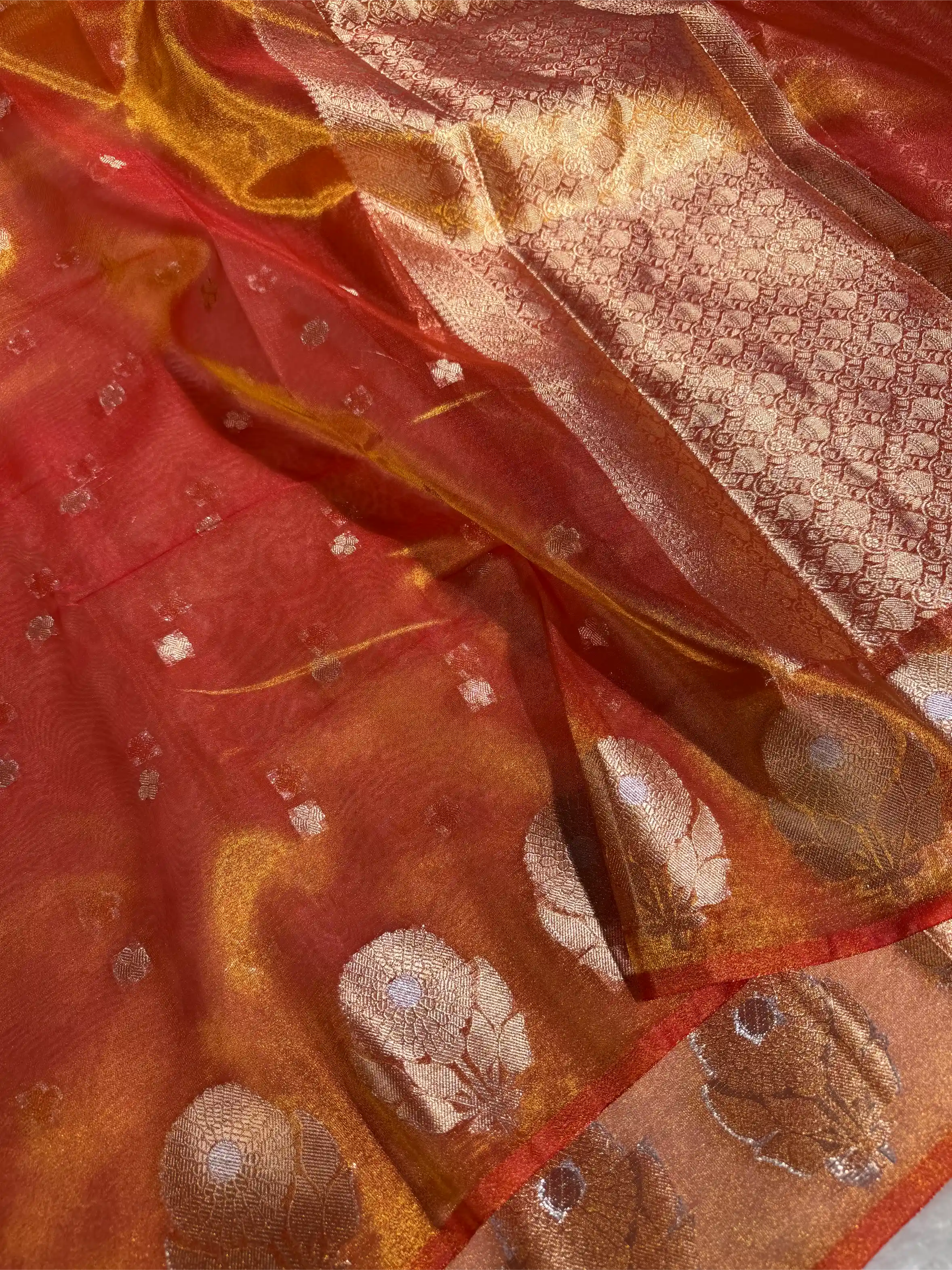 Metallic Orange Eccentric Soft Tissue Silk Banarasi Saree