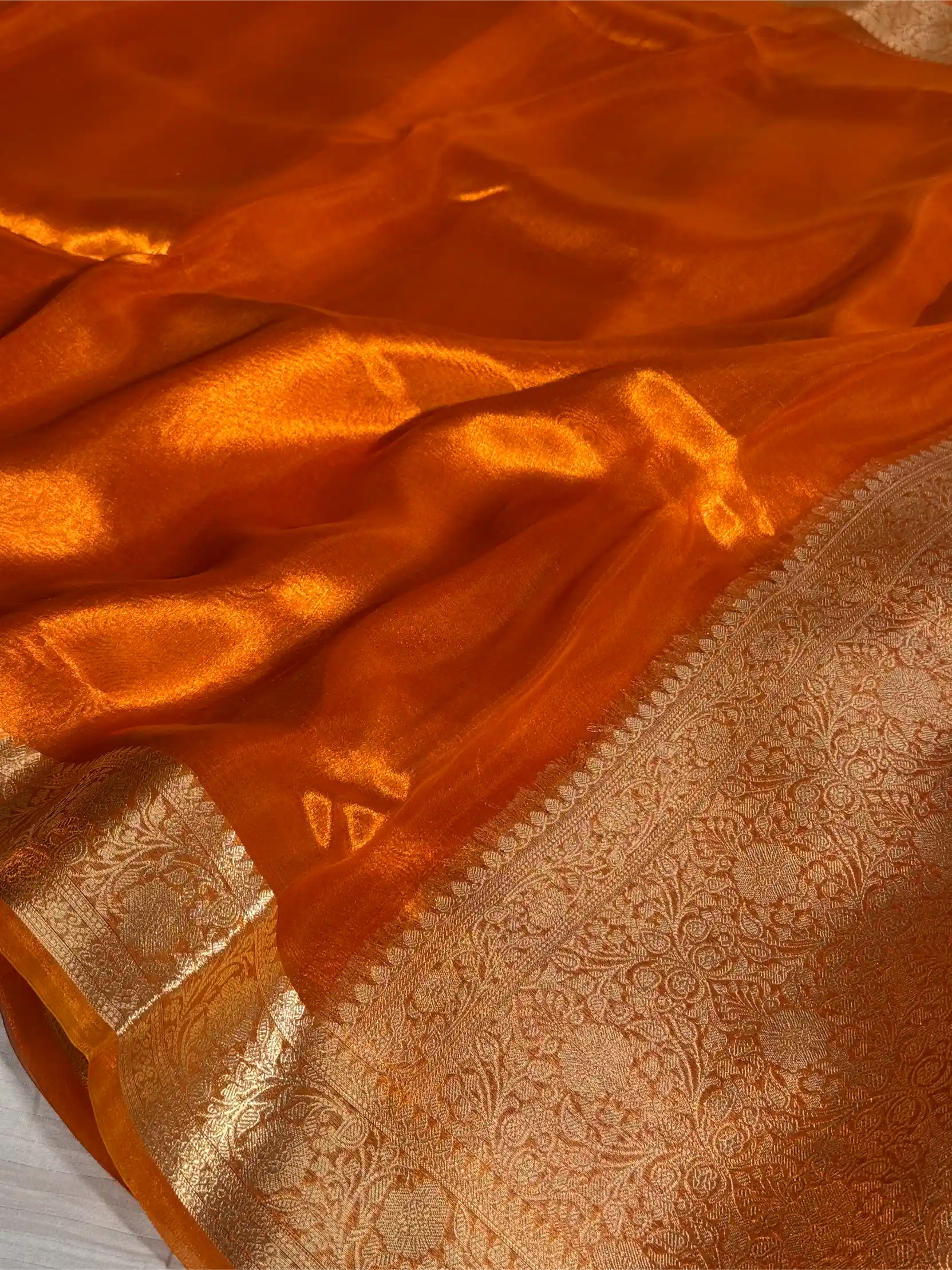 Metallic Orange Pure Tissue Silk Traditional Weave Banarasi Saree