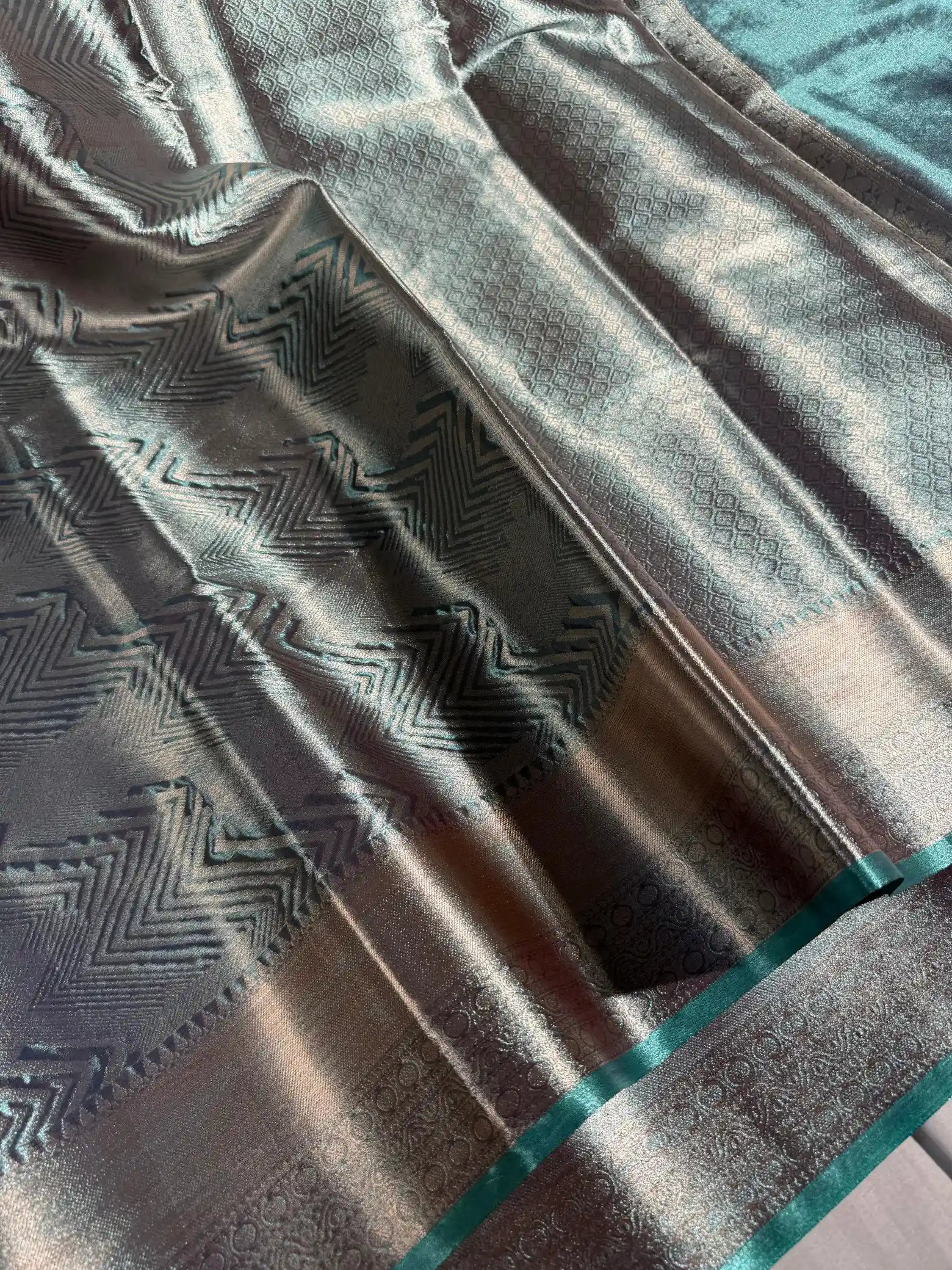 Molten Firozi Zari Texture Kanjivaram Tissue Silk Saree in Contemporary Abstract Weave