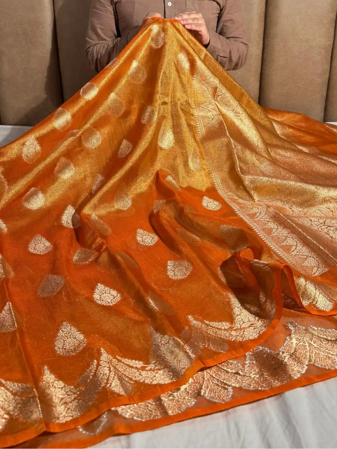 Orange Tissue banarasi saree with rich pallu and blouse