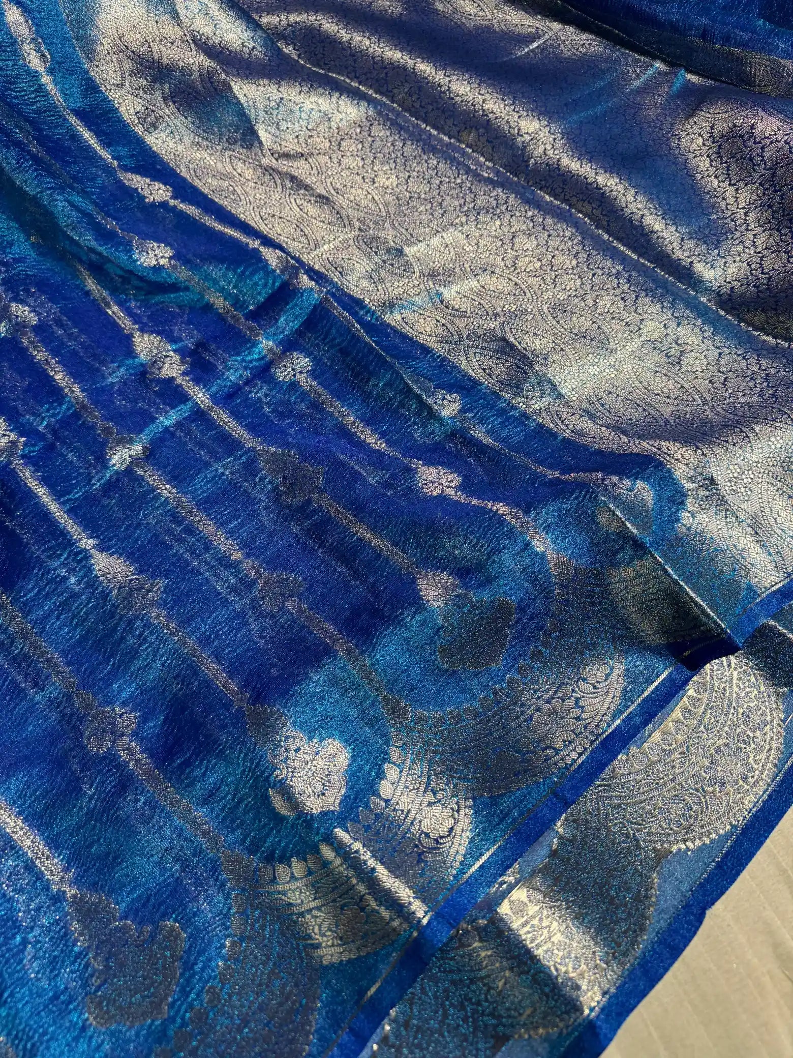 Premium Metallic Blue crush tissue silk saree with rich pallu and blouse