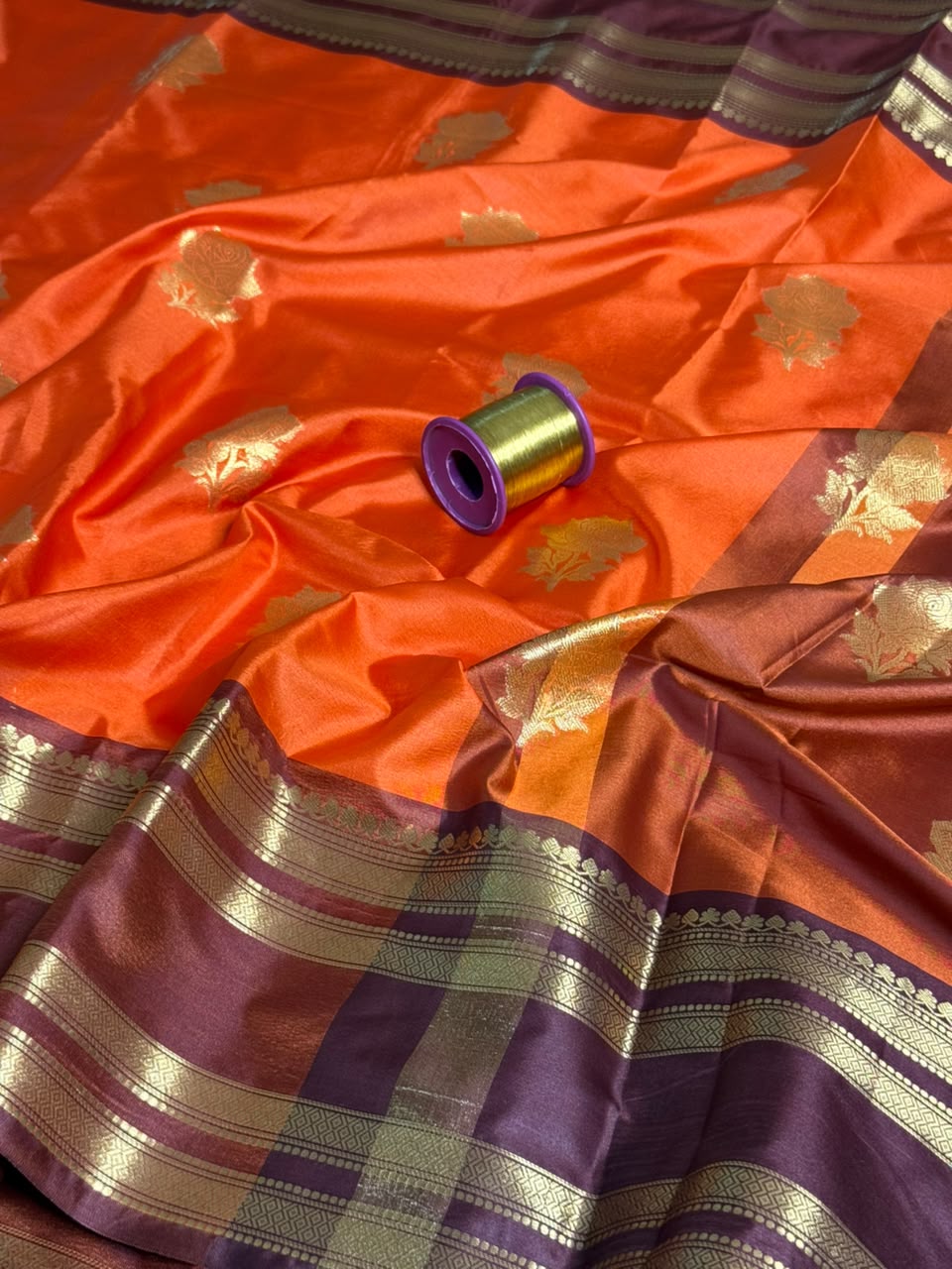 Bright orange floral buta Softsilk saree