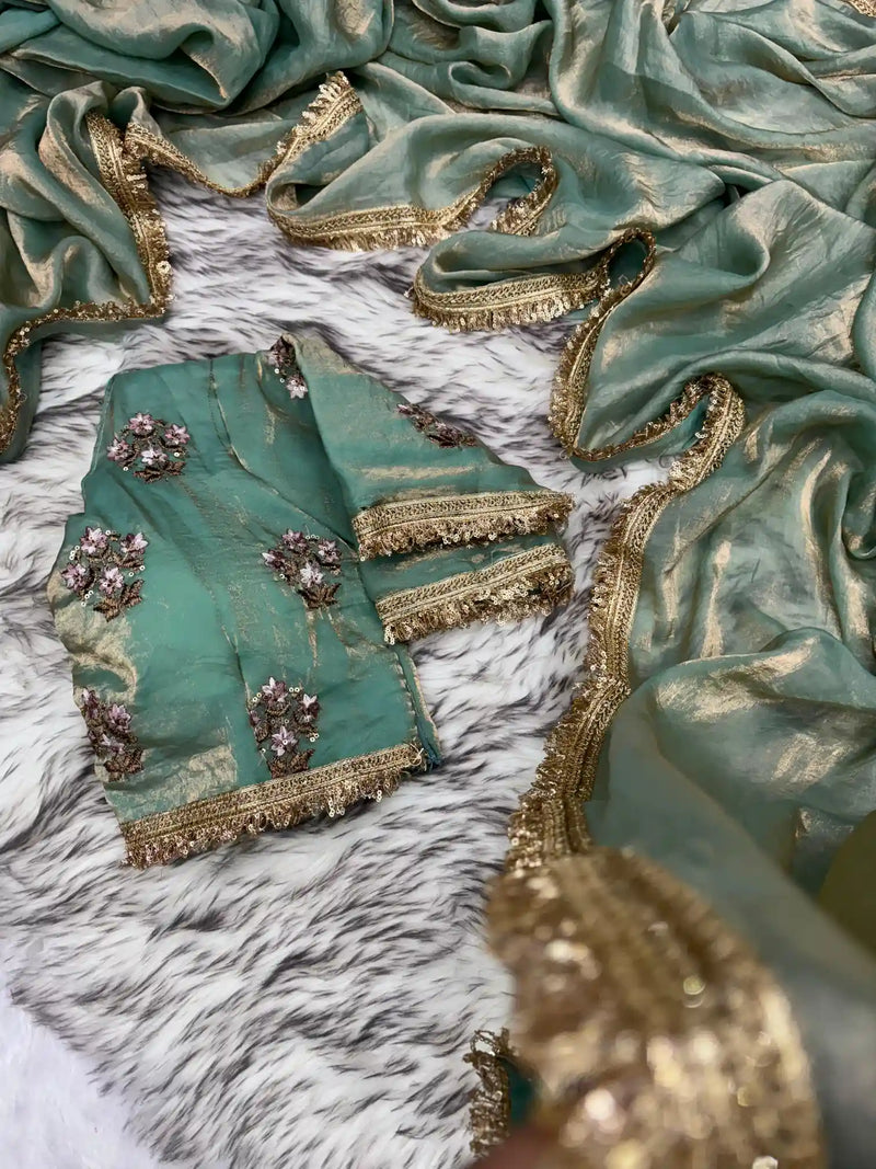 Sea Green Shimmery Tissue Saree With Pretty Lace Work