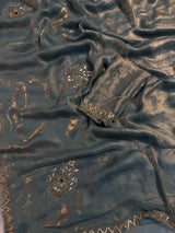 Shimmery tissue silk saree with handwork and designer blouse