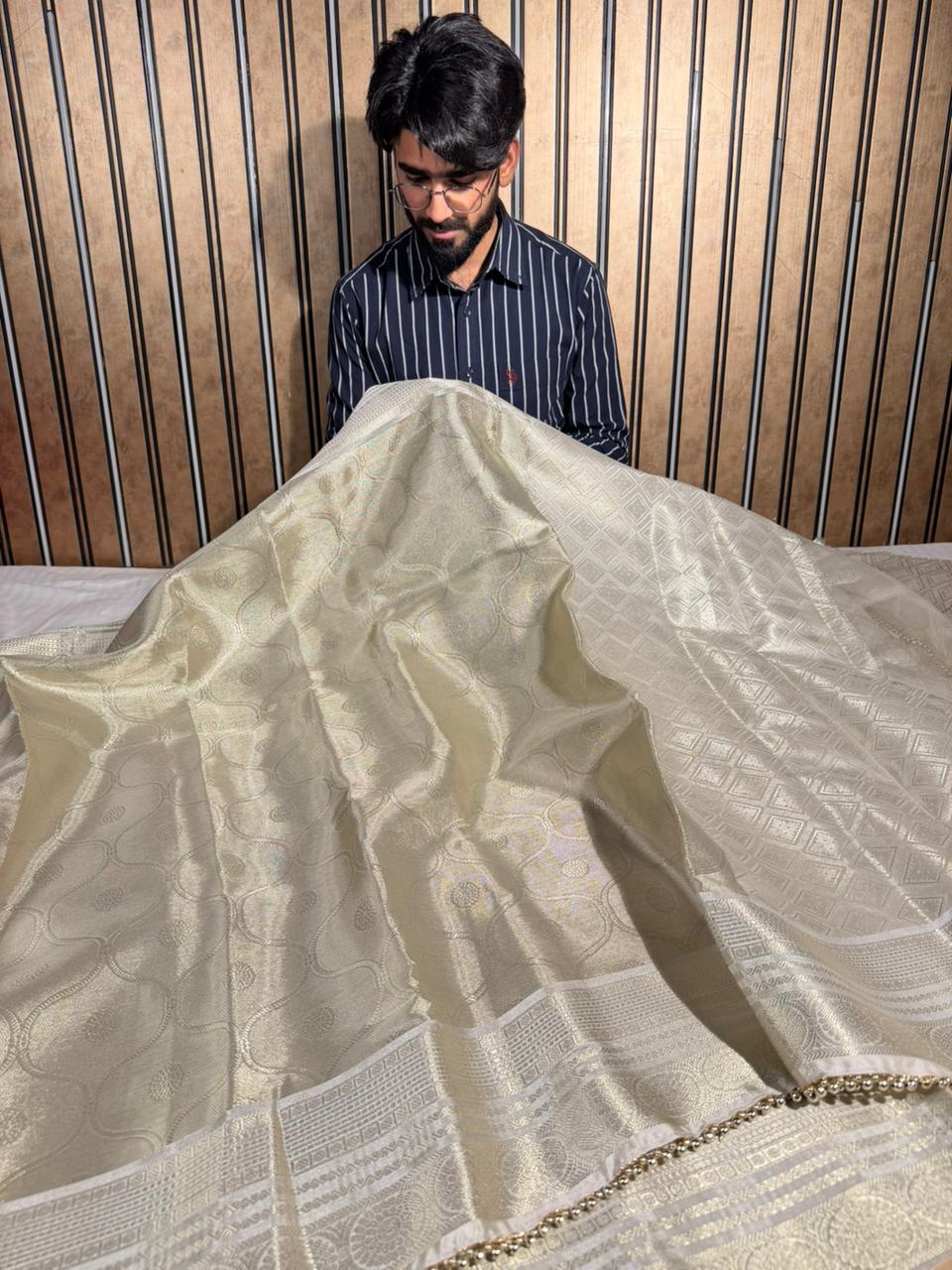 Ivory embossed kanjivaram tissue designer saree