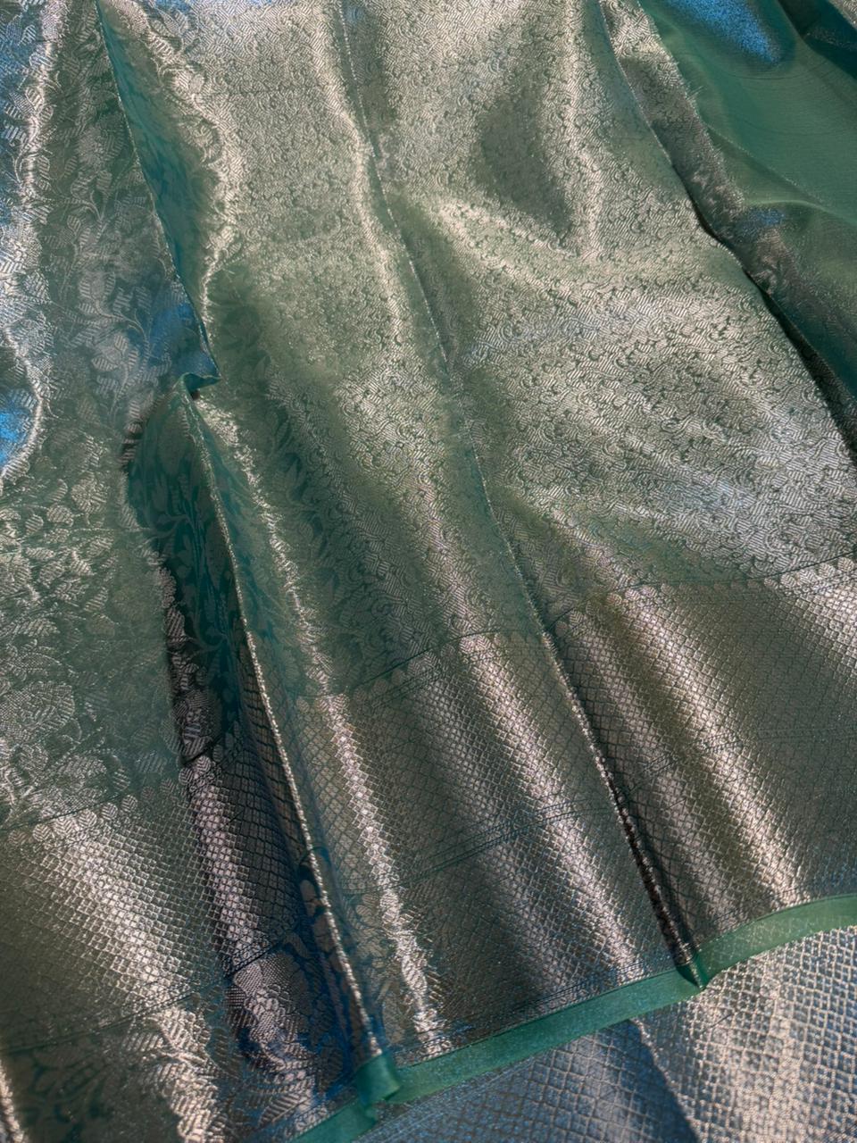 Dhoop chaon blue embossed glass tissue saree