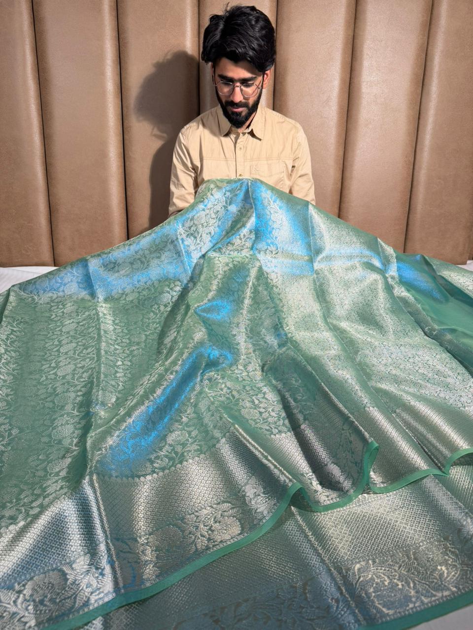 Dhoop chaon blue embossed glass tissue saree