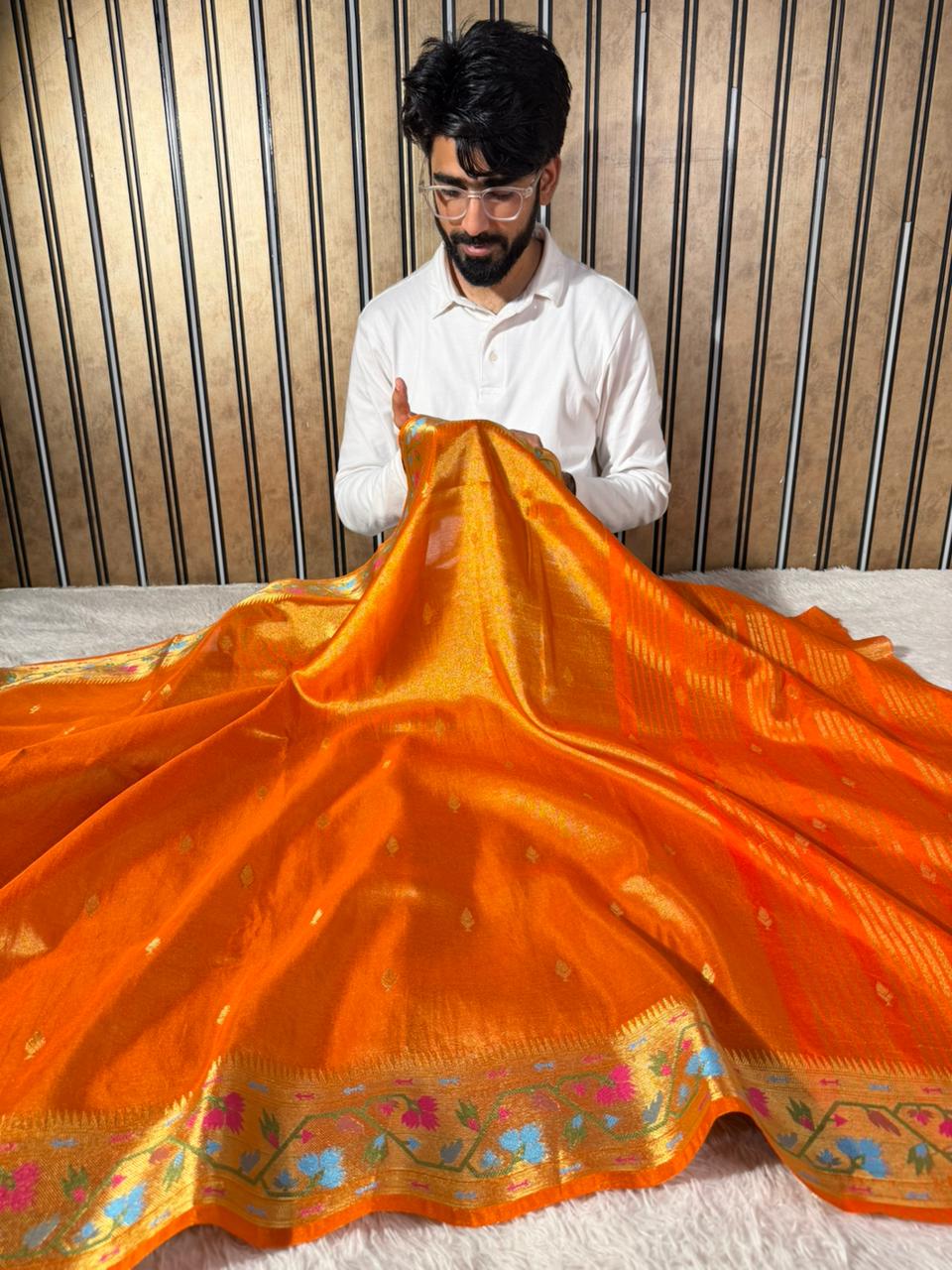Metallic Orange Breathable tissue Ikkat Border Saree