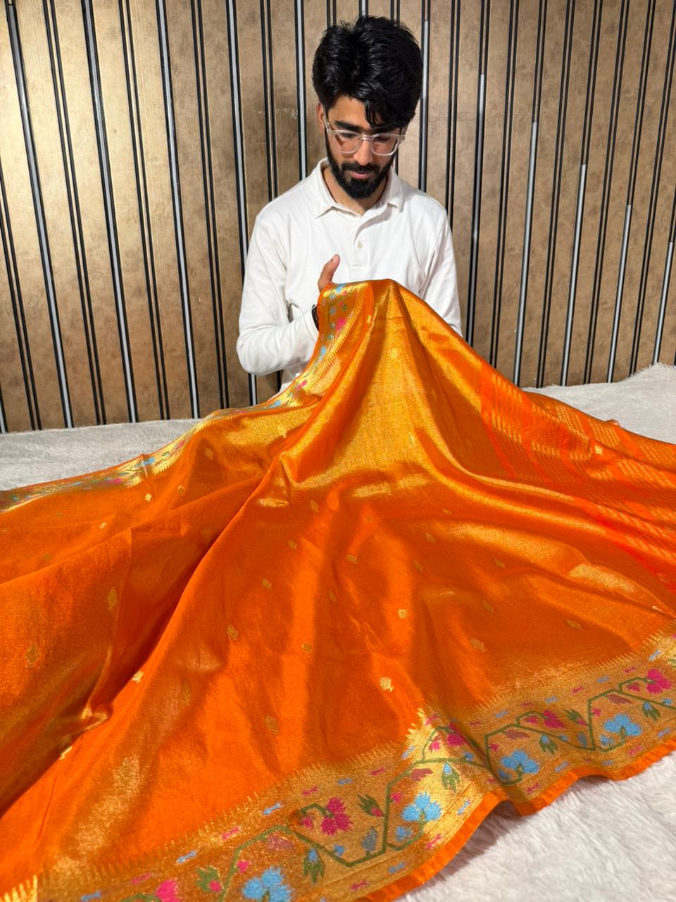 Metallic Orange Breathable tissue Ikkat Border Saree