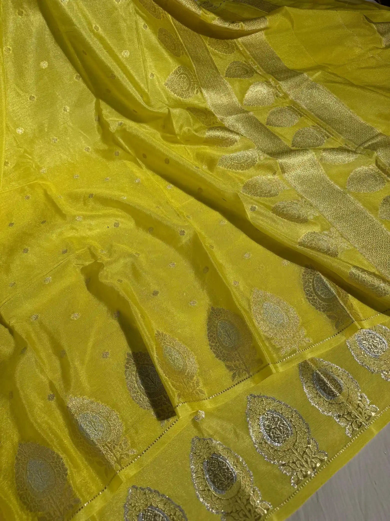 Yellow shade chiniya silk saree with rich pallu and blouse 